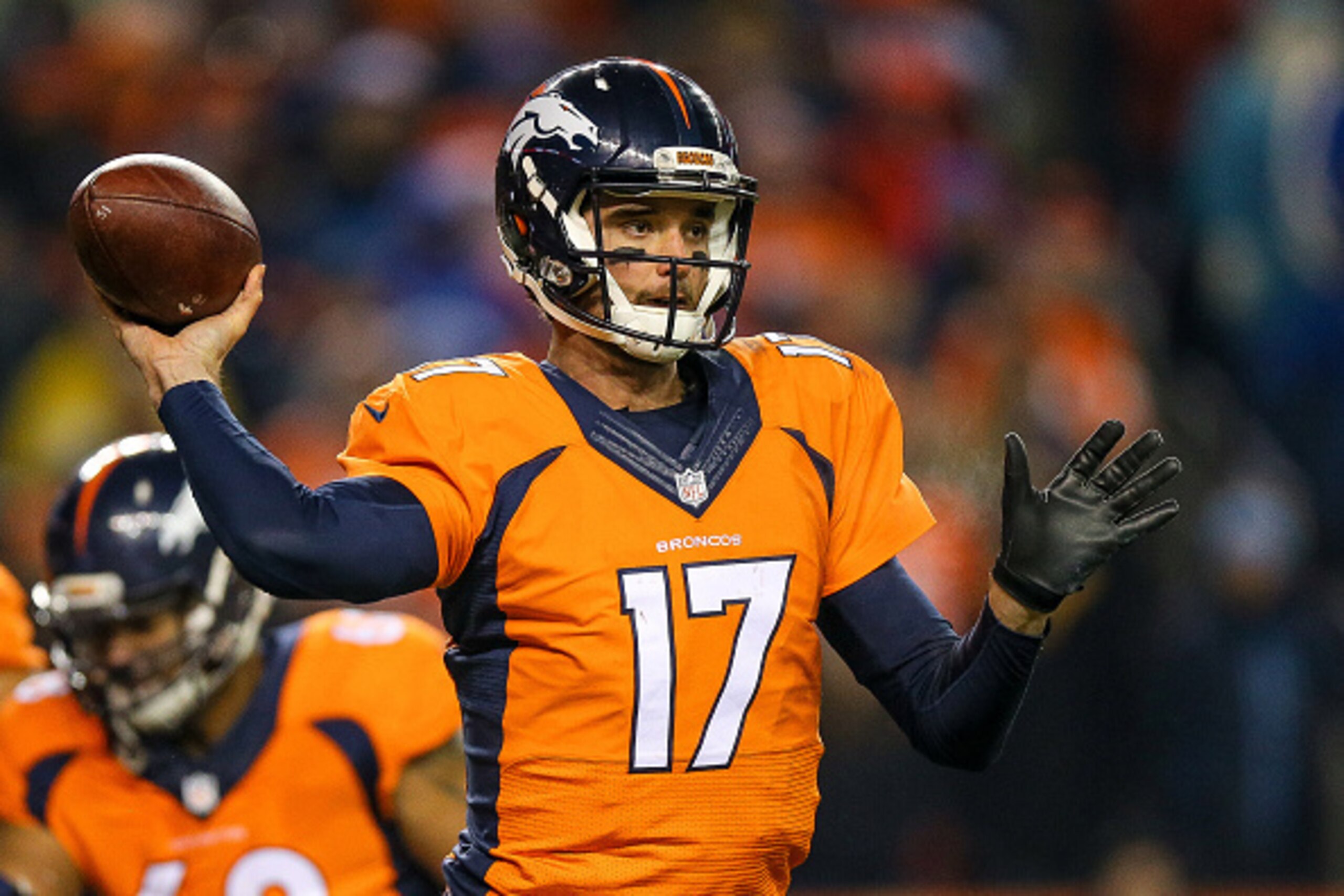 DENVER, CO - DECEMBER 28:  Quarterback Brock Osweiler #17 of the Denver Broncos passes against the Cincinnati Bengals during a game at Sports Authority Field at Mile High on December 28, 2015 in Denver, Colorado. (Photo by Justin Edmonds/Getty Images)