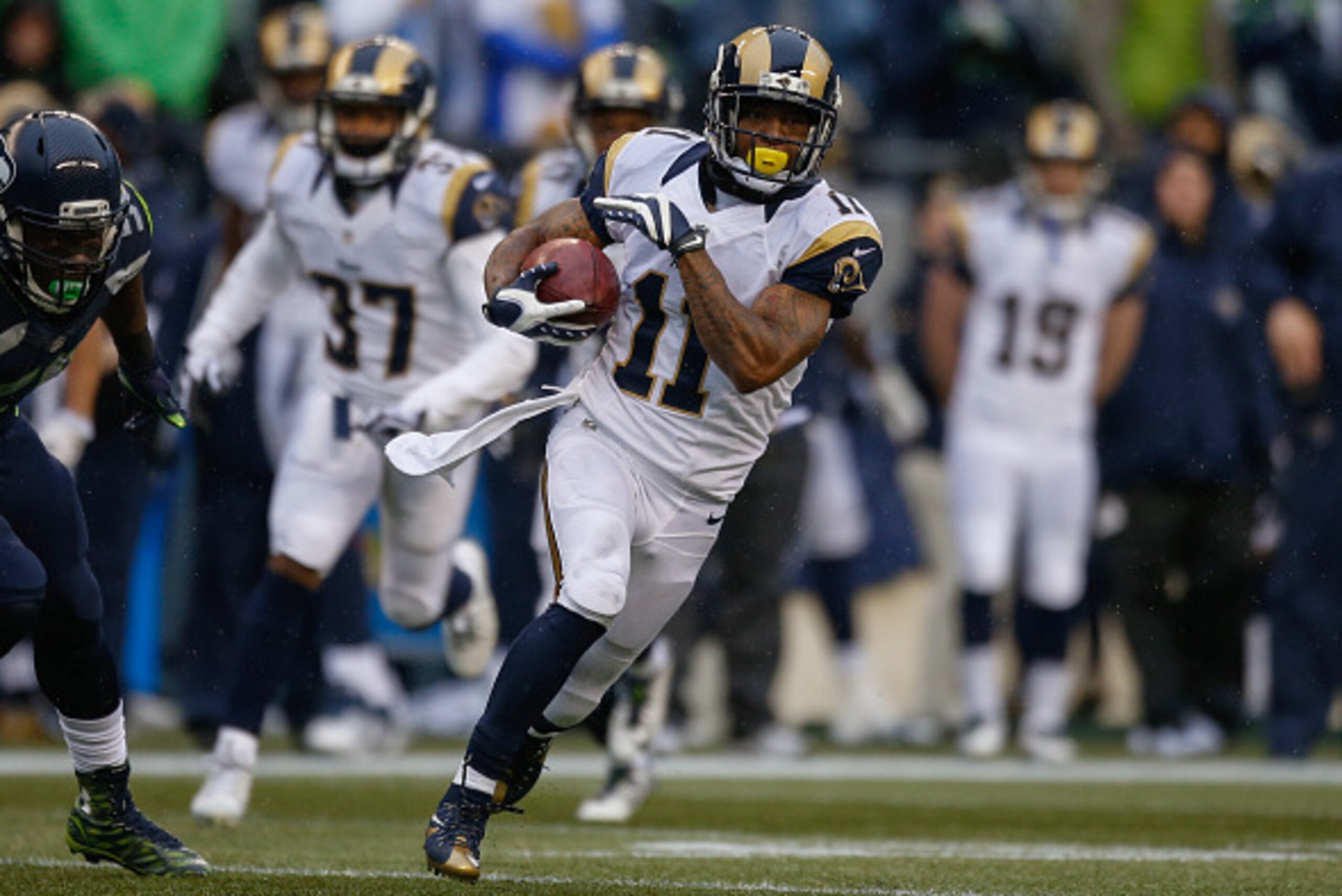 SEATTLE, WA - DECEMBER 27:  Wide receiver Tavon Austin #11 of the St. Louis Rams rushes against the Seattle Seahawks at CenturyLink Field on December 27, 2015 in Seattle, Washington.  (Photo by Otto Greule Jr/Getty Images)