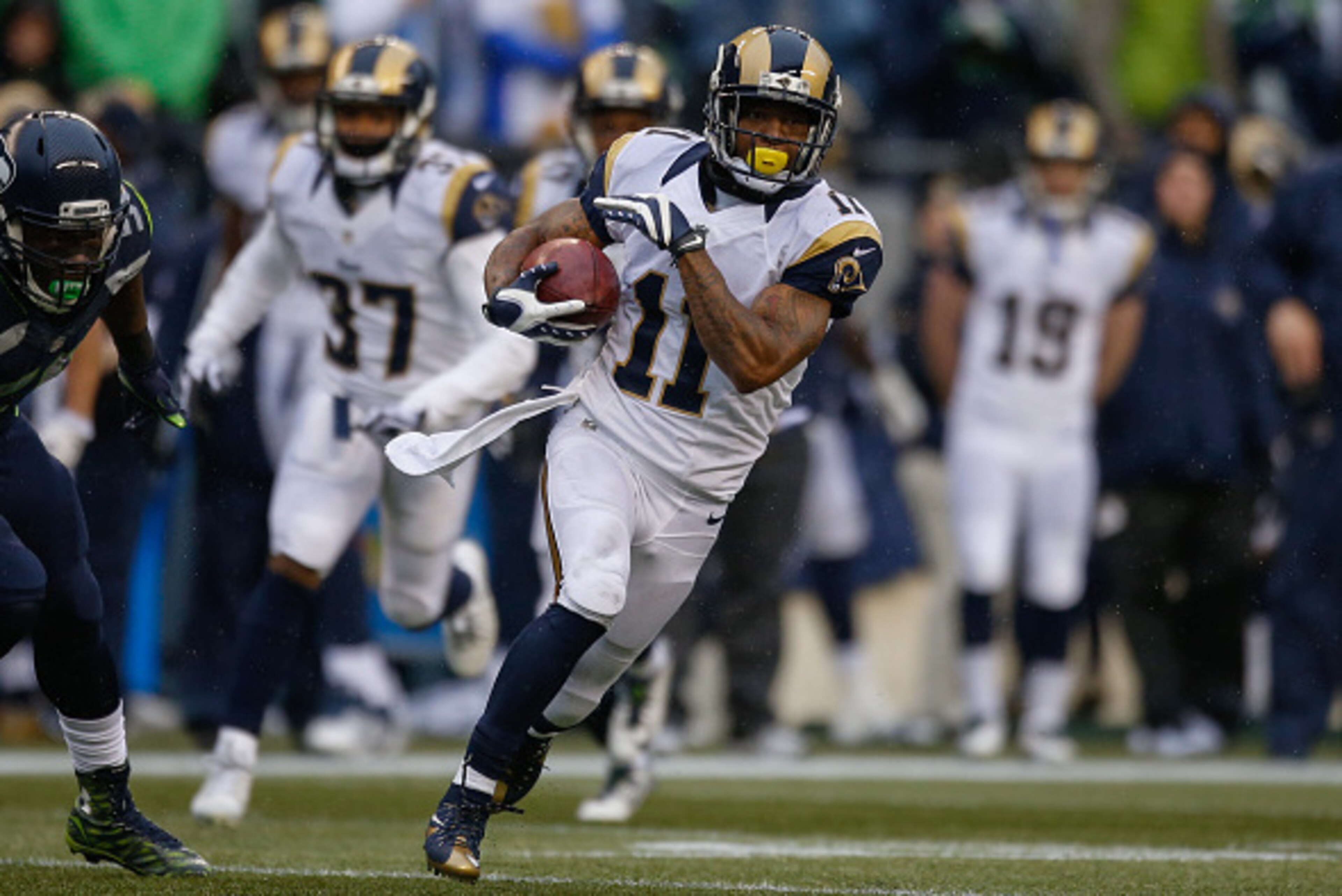 SEATTLE, WA - DECEMBER 27:  Wide receiver Tavon Austin #11 of the St. Louis Rams rushes against the Seattle Seahawks at CenturyLink Field on December 27, 2015 in Seattle, Washington.  (Photo by Otto Greule Jr/Getty Images)