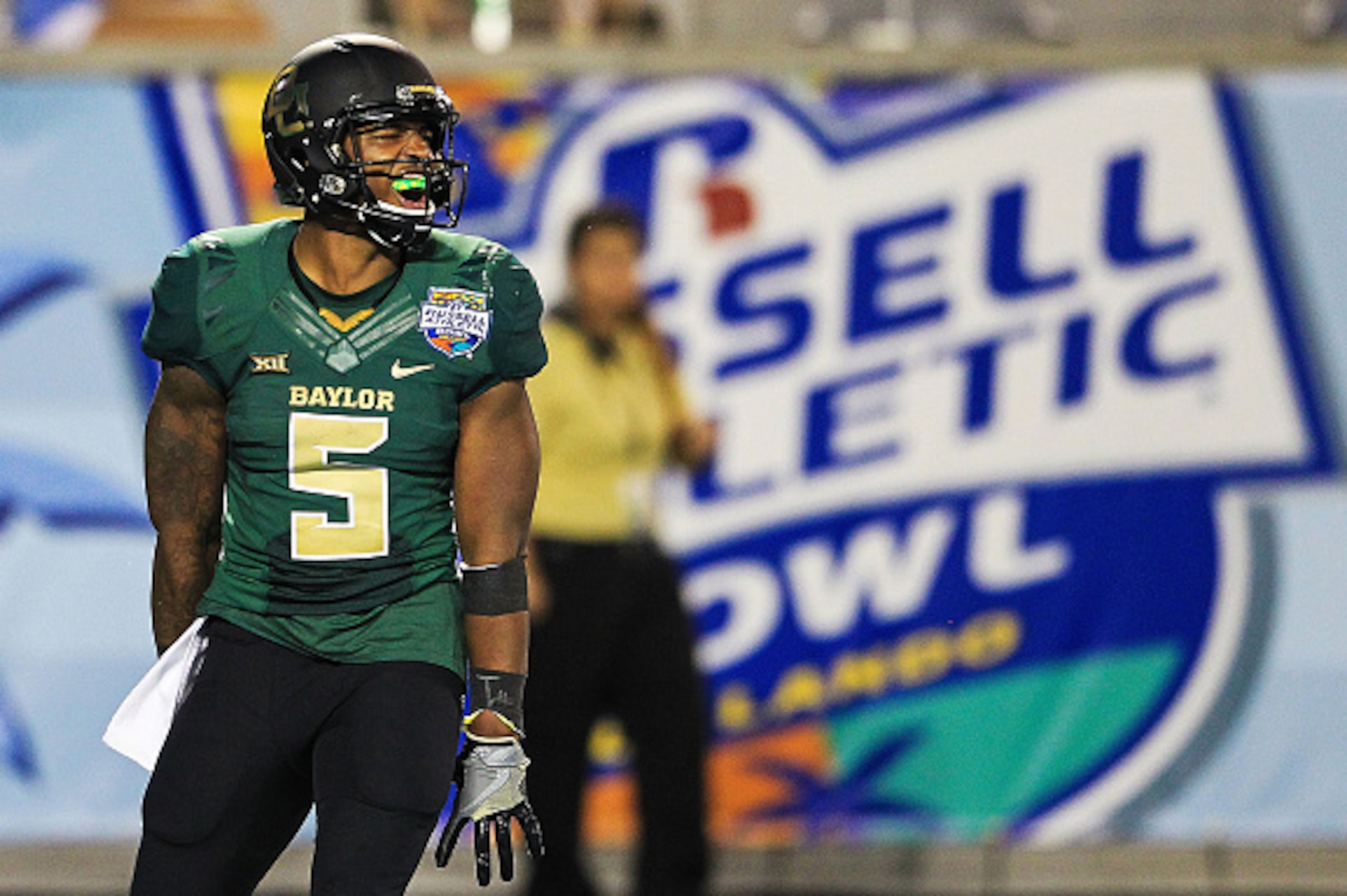 ORLANDO, FL - DECEMBER 29: Johnny Jefferson #5 of the Baylor Bears reacts after scoring a touchdown during the second half of the Russell Athletic Bowl game against the North Carolina Tar Heels at Orlando Citrus Bowl on December 29, 2015 in Orlando, Flori