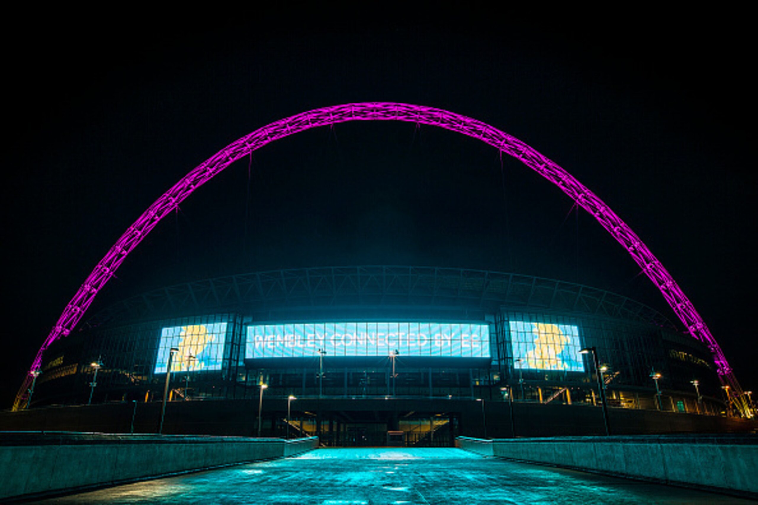 LONDON, ENGLAND - SEPTEMBER 29:  To celebrate Breast Cancer Awareness month, the Wembley Arch turns pink to highlight The Football Association and Breast Cancer Care's new 'Pass it on' campaign at Wembley Stadium on September 29, 2014 in London, England. 