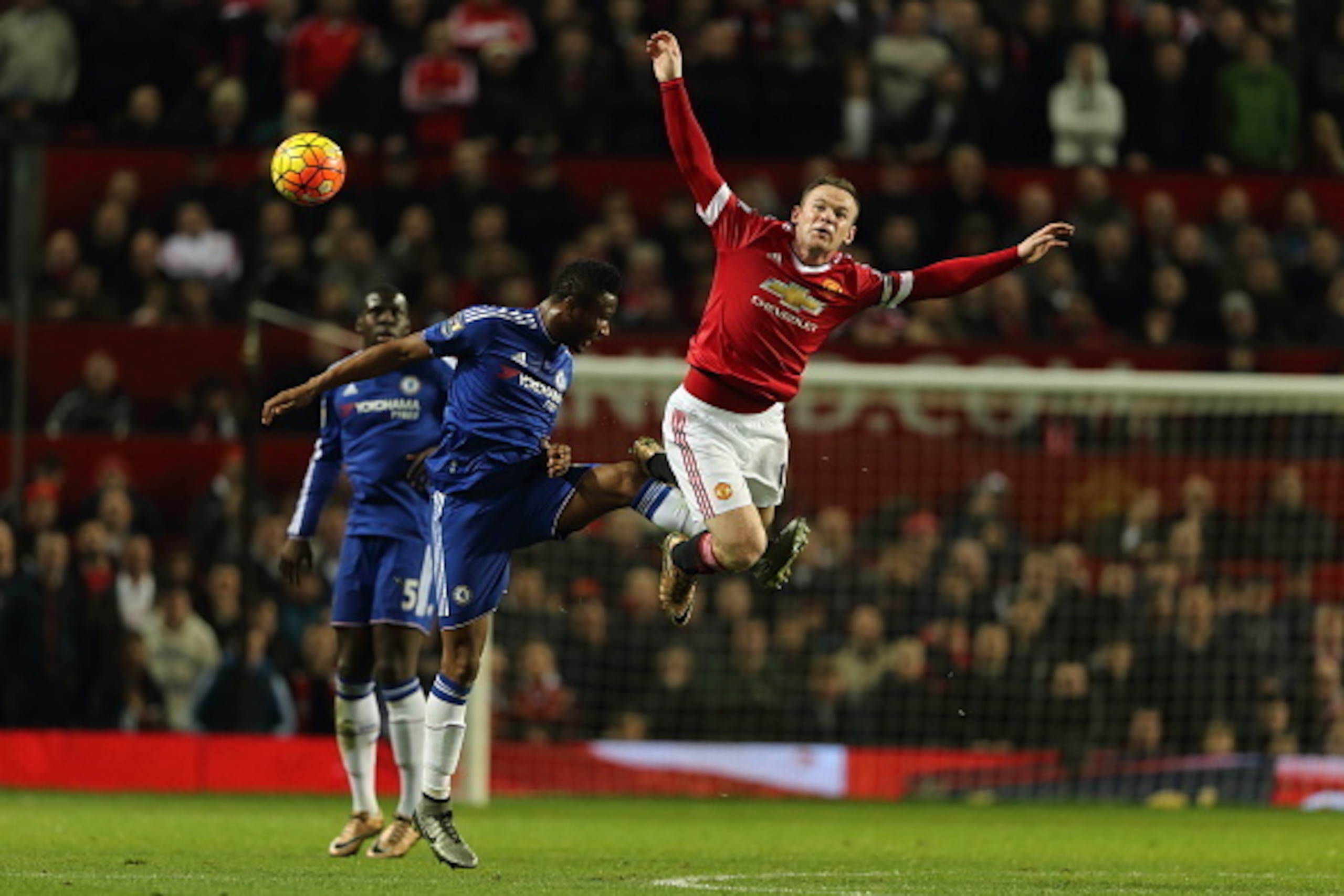 MANCHESTER, ENGLAND - DECEMBER 28:  John Obi Mikel of Chelsea and Wayne Rooney of Manchester United during the Barclays Premier League match between Manchester Untied and Chelsea at Old Trafford on December 28, 2015 in Manchester, England.  (Photo by Matt