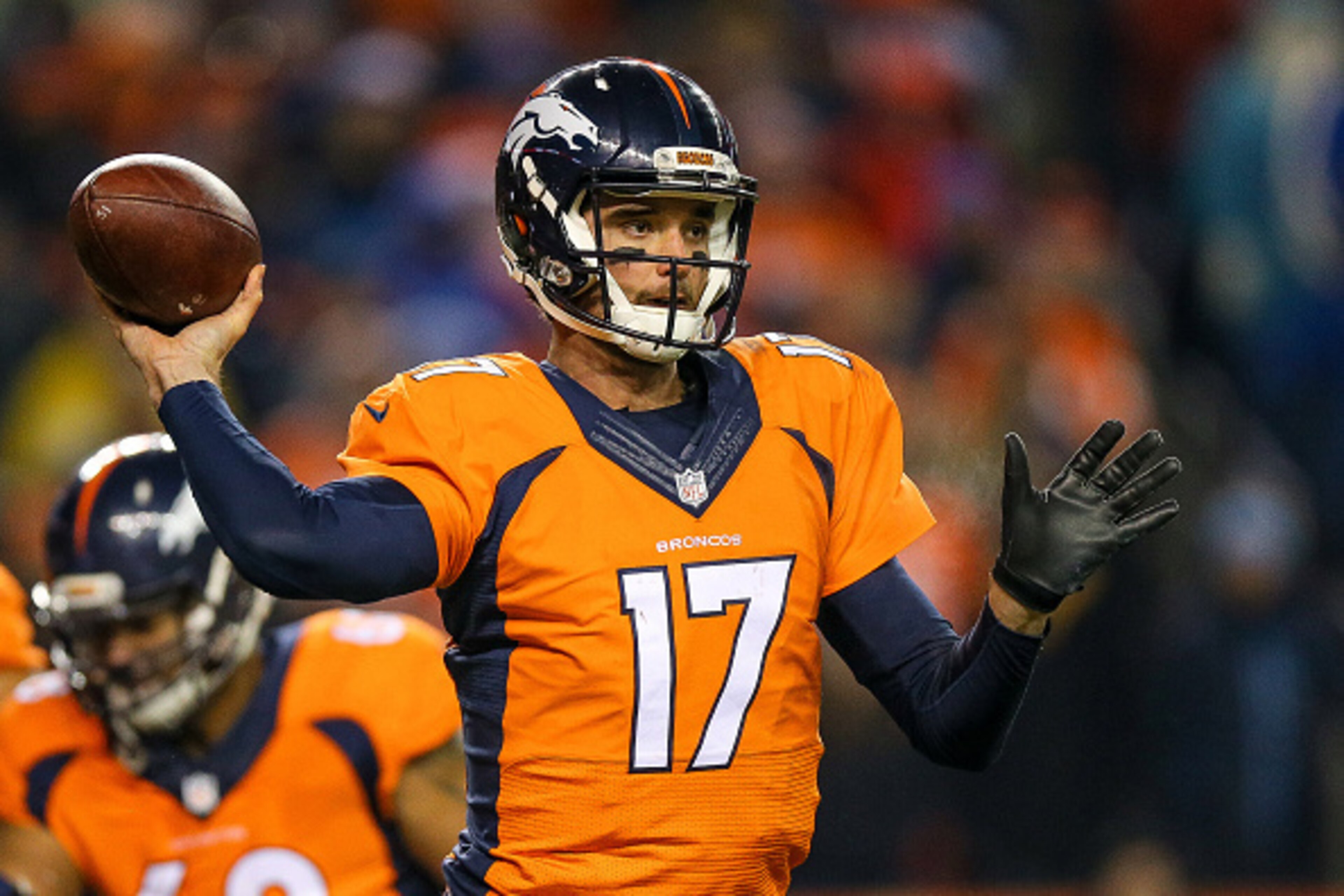 DENVER, CO - DECEMBER 28:  Quarterback Brock Osweiler #17 of the Denver Broncos passes against the Cincinnati Bengals during a game at Sports Authority Field at Mile High on December 28, 2015 in Denver, Colorado. (Photo by Justin Edmonds/Getty Images)