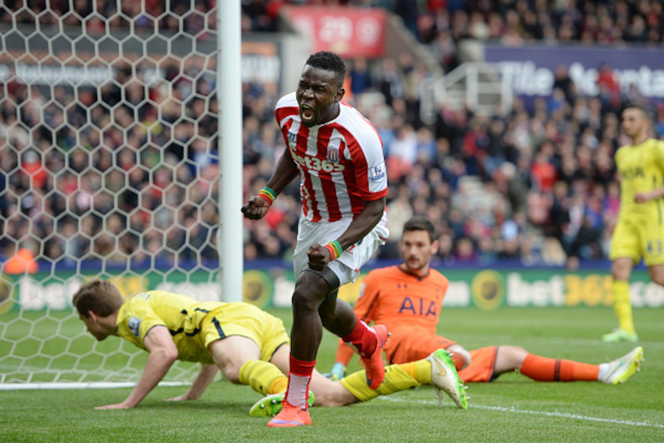 STOKE ON TRENT, ENGLAND - MAY 09:  Mame Biram Diouf of Stoke City celebrates his team's third goal during the Barclays Premier League match between Stoke City and Tottenham Hotspur at Britannia Stadium on May 9, 2015 in Stoke on Trent, England.  (Photo by