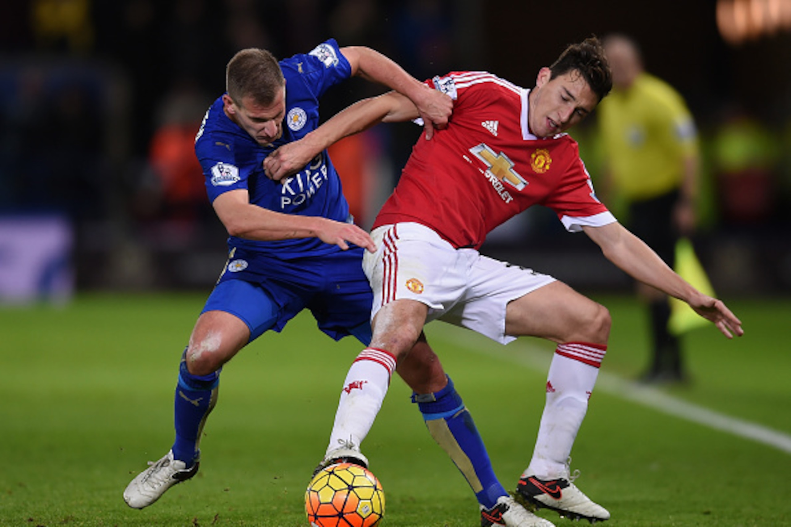 LEICESTER, ENGLAND - NOVEMBER 28: Matteo Darmian of Manchester United and Marc Albrighton of Leicester City compete for the ball during the Barclays Premier League match between Leicester City and Manchester United at The King Power Stadium on November 2 LEICESTER, ENGLAND - NOVEMBER 28: Matteo Darmian of Manchester United and Marc Albrighton of Leicester City compete for the ball during the Barclays Premier League match between Leicester City and Manchester United at The King Power Stadium on November 2