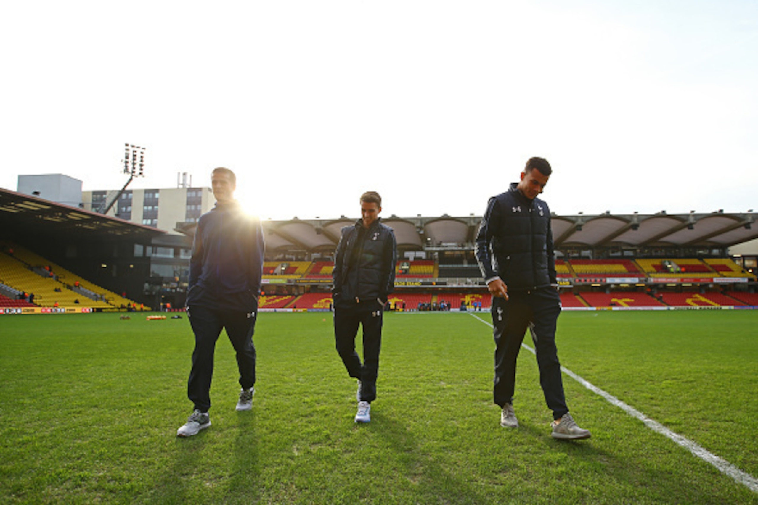 WATFORD, ENGLAND - DECEMBER 28:  Dele Alli (R), Eric Dier (L) and Tom Carroll (C) of Tottenham Hotspur inspect the pitch prior to the Barclays Premier League match between Watford and Tottenham Hotspur at Vicarage Road on December 28, 2015 in Watford, Eng