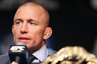 LAS VEGAS, NV - NOVEMBER 14: UFC welterweight champion Georges St-Pierre interacts with media during the final UFC 167 pre-fight press conference inside the Hollywood Theatre at the MGM Grand Hotel/Casino on November 14, 2013 in Las Vegas, Nevada. (Photo 
