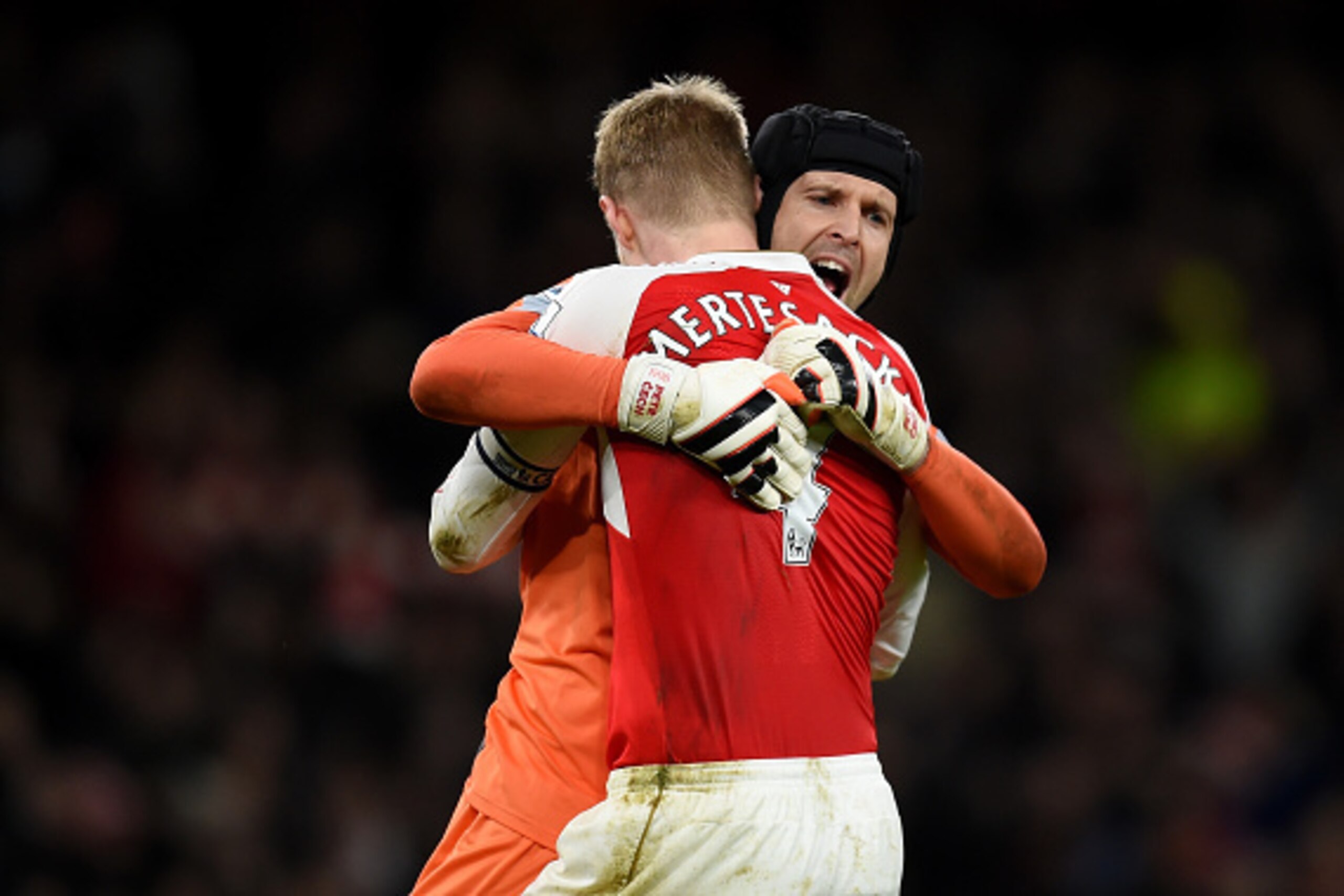 LONDON, ENGLAND - DECEMBER 21:  Petr Cech of Arsenal celebrates with Per Mertesacker of Arsenal on the final whistle during the Barclays Premier League match between Arsenal and Manchester City at Emirates Stadium on December 21, 2015 in London, England. 