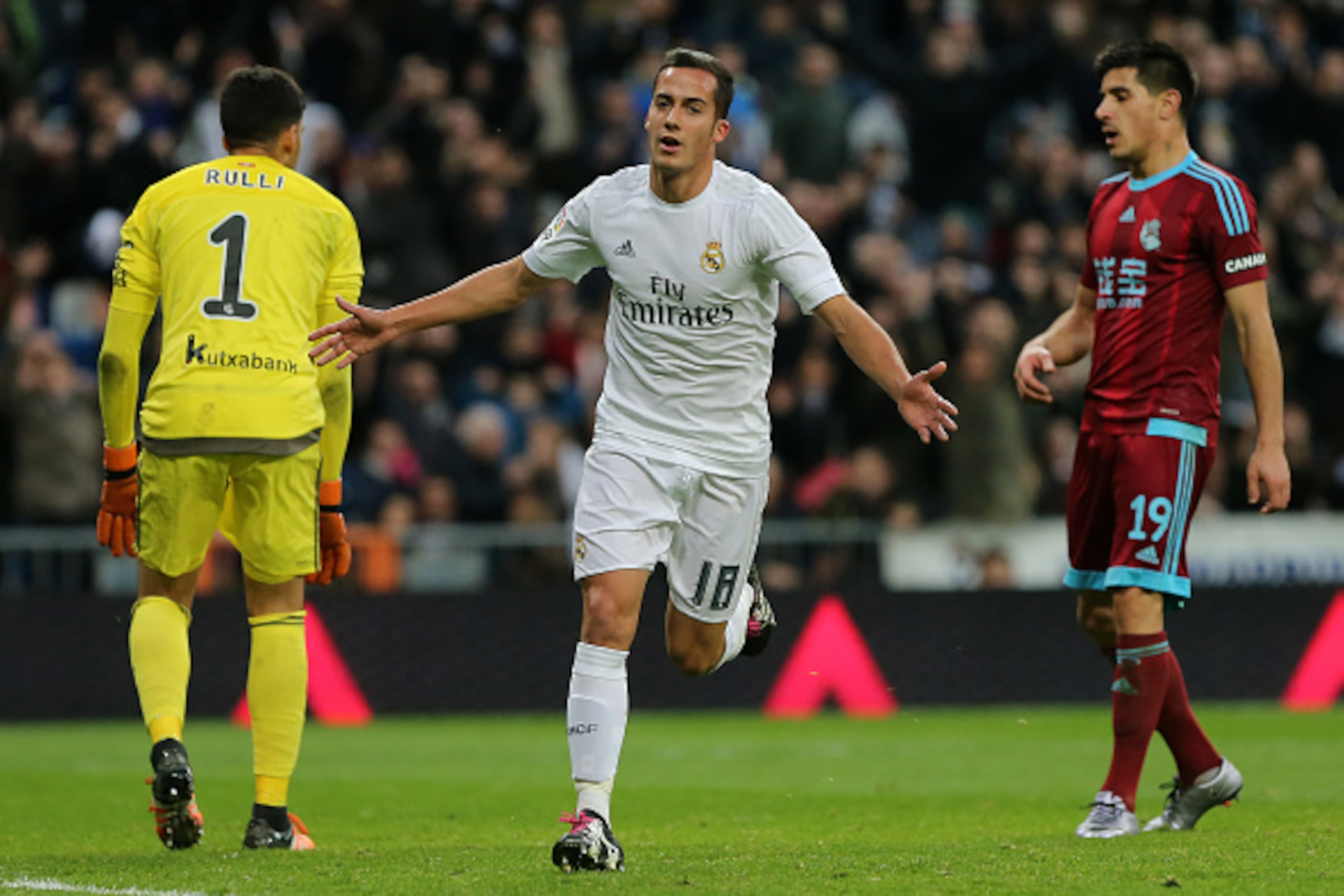 Real Madrid's midfielder Lucas celebrates after scoring during the Spanish league football match Real Madrid CF vs Real Sociedad de Futbol at the Santiago Bernabeu stadium in Madrid on December 30, 2015. AFP PHOTO/ CESAR MANSO / AFP / CESAR MANSO        (