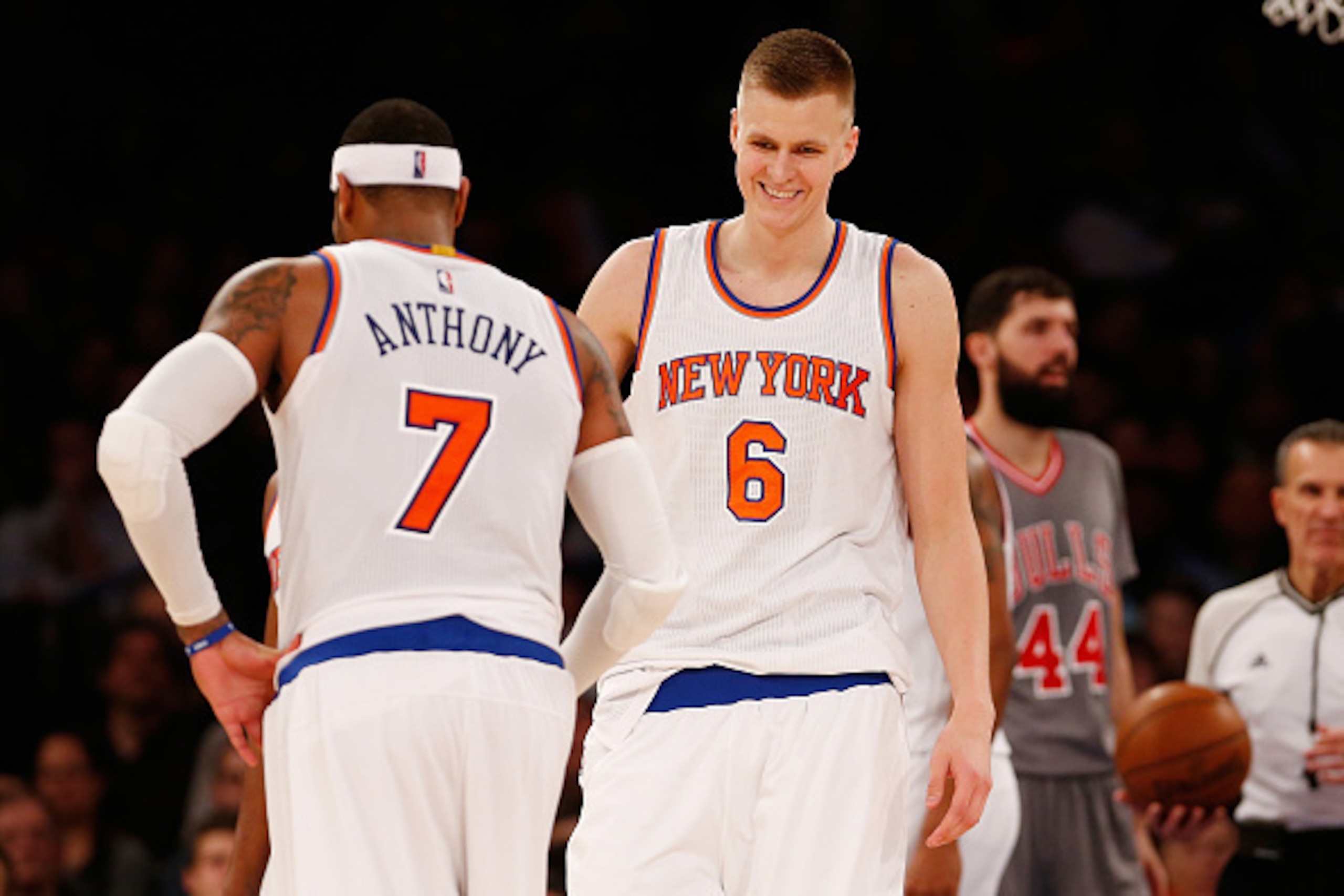 NEW YORK, NY - DECEMBER 19:  Kristaps Porzingis #6 and Carmelo Anthony #7 of the New York Knicks looks on against the Chicago Bulls at Madison Square Garden on December 19, 2015 in New York City.  Knicks defeated the Bulls 107-91. NOTE TO USER: User expre