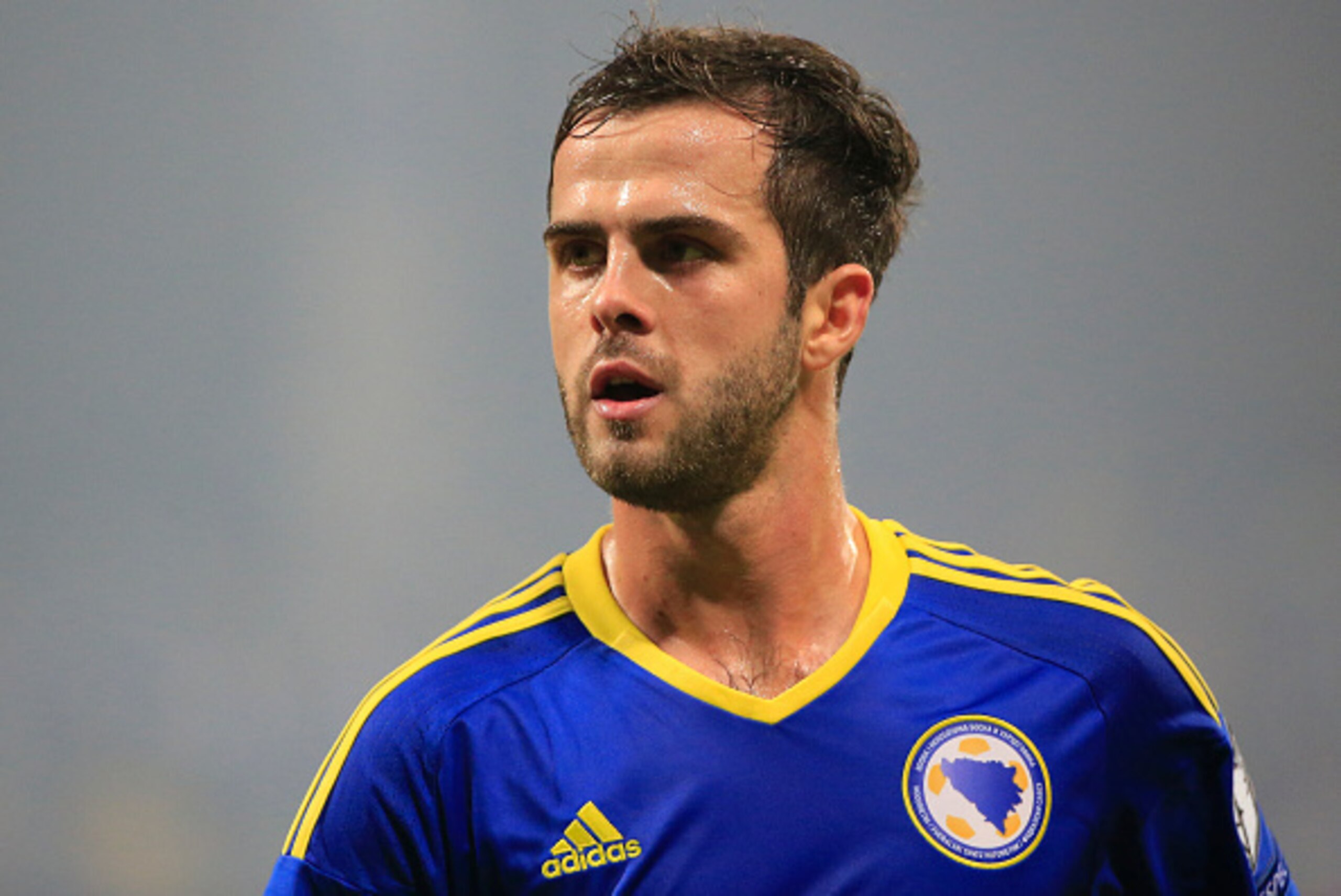 ZENICA, BOSNIA AND HERZEGOVINA - NOVEMBER 13. Miralem Pjanic of Bosnia looks on during the EURO 2016 Qualifier Play-Off First Leg match at Bilino Polje Stadium on November 13, 2015 in Zenica, Bosnia and Herzegovina. (Photo by Srdjan Stevanovic/Getty Image