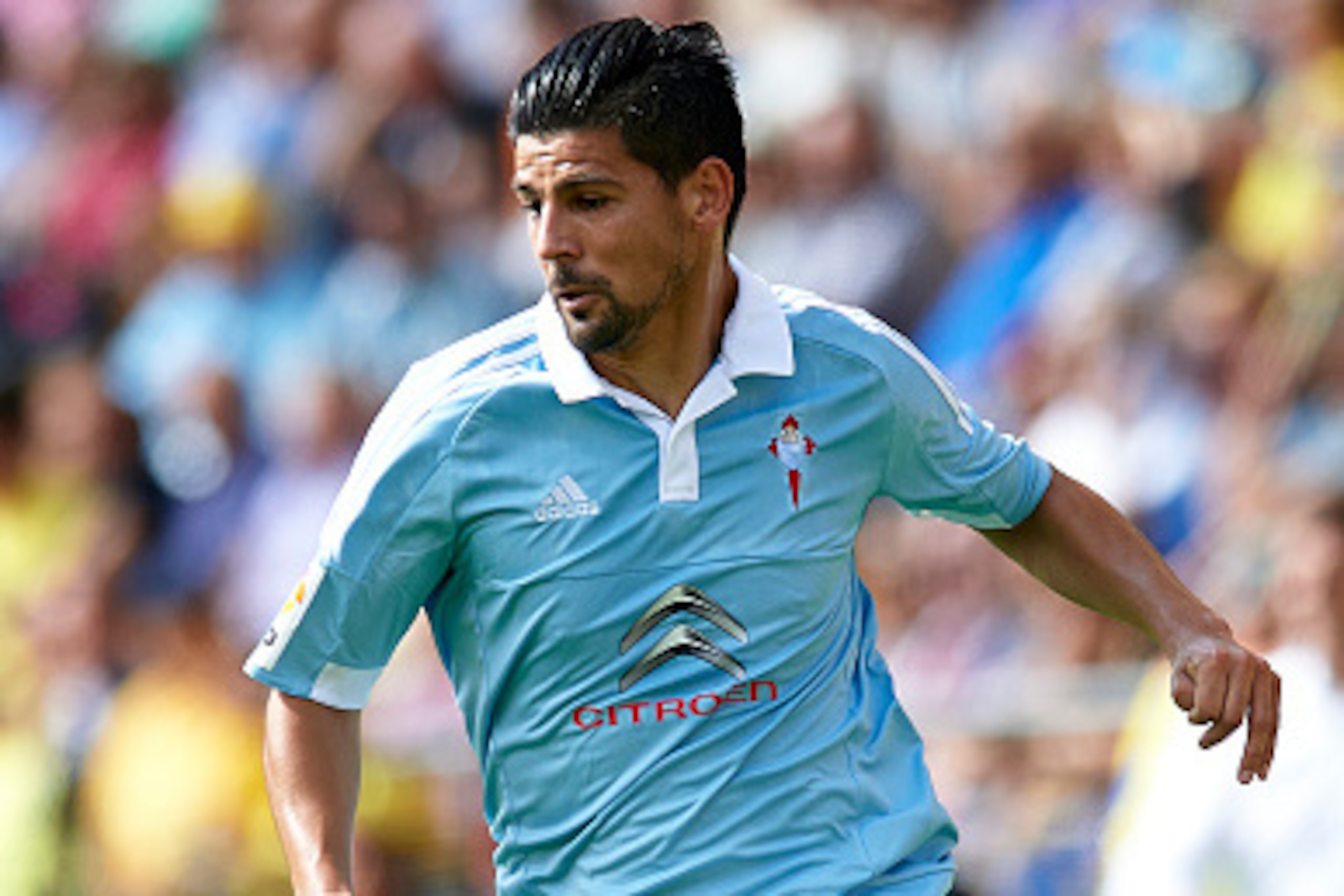 VILLARREAL, SPAIN - OCTOBER 18:  Nolito of Celta runs with the ball during the La Liga match between Villarreal CF and RC Celta de Vigo at El Madrigal Stadium on October 18, 2015 in Villarreal, Spain.  (Photo by Manuel Queimadelos Alonso/Getty Images)
