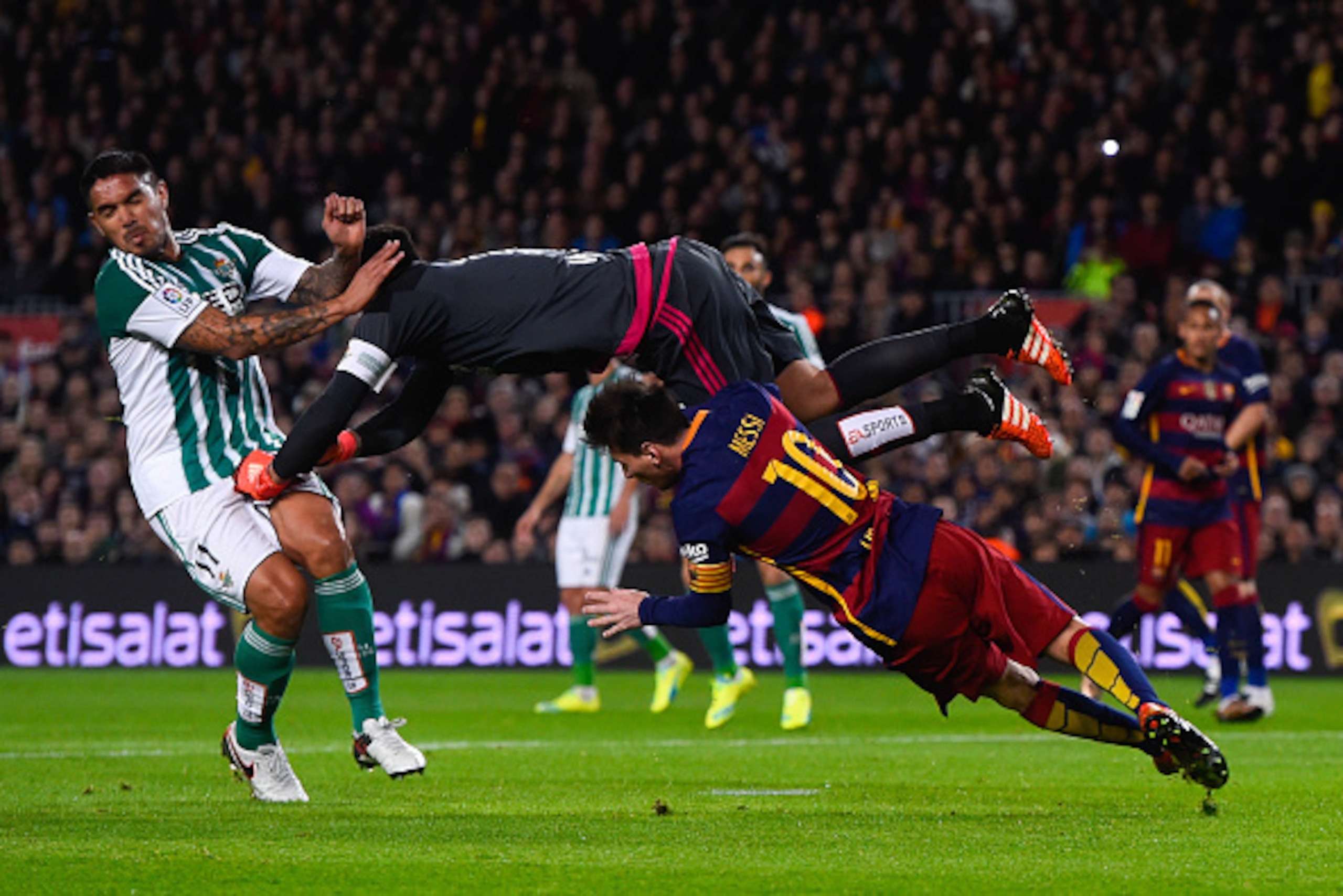 BARCELONA, SPAIN - DECEMBER 30:  Lionel Messi of FC Barcelona and Adan (C) of Real Betis Balompie clash during the La Liga match between FC Barcelona and Real Betis Balompie at Camp Nou on December 30, 2015 in Barcelona, Spain.  (Photo by David Ramos/Gett