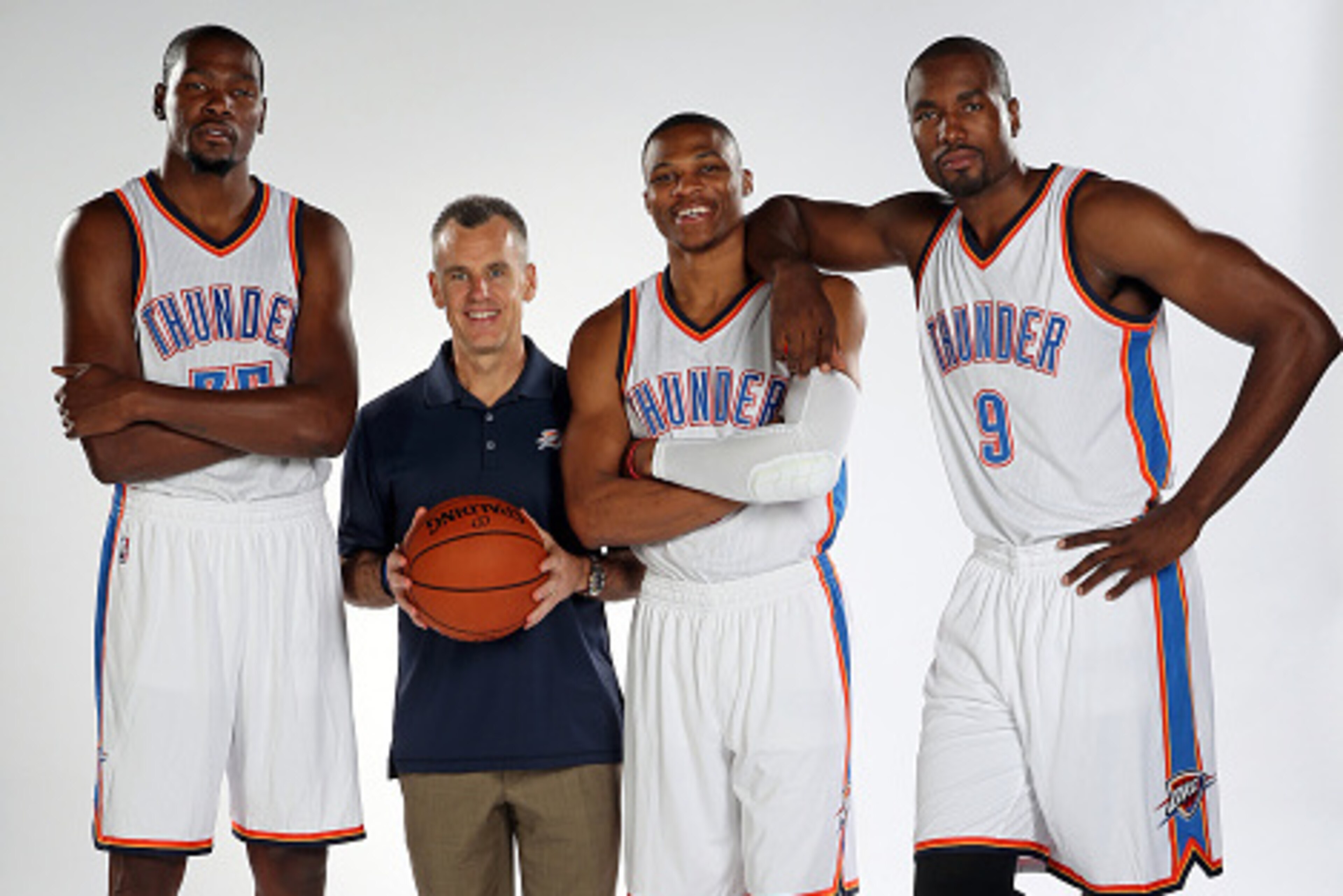 OKLAHOMA CITY, OK - SEPTEMBER 28: Kevin Durant #35, head coach Billy Donovan, Russell Westbrook #0 and Serge Ibaka #9 of the Oklahoma City Thunder pose for a portrait during 2015 NBA Media Day on September 28, 2015 at the Thunder Events Center in Edmond, OKLAHOMA CITY, OK - SEPTEMBER 28: Kevin Durant #35, head coach Billy Donovan, Russell Westbrook #0 and Serge Ibaka #9 of the Oklahoma City Thunder pose for a portrait during 2015 NBA Media Day on September 28, 2015 at the Thunder Events Center in Edmond,