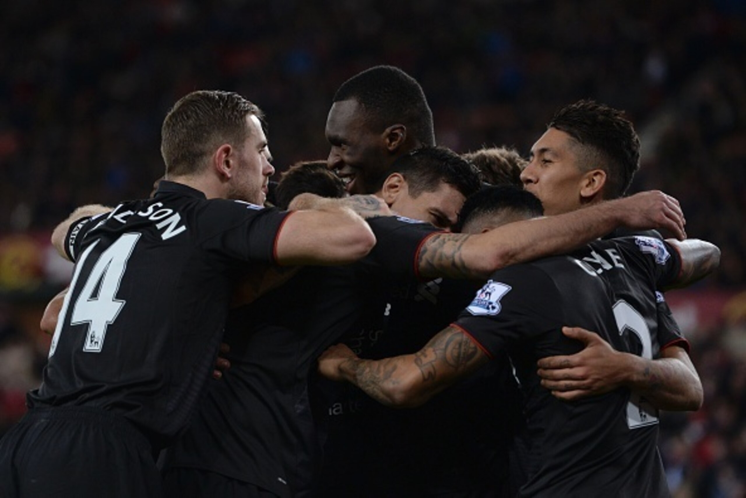 Liverpool players crowd around Liverpool's Zaire-born Belgian striker Christian Benteke (C) to celerbate after Benteke scored the opening goal during the English Premier League football match between Sunderland and Liverpool at the Stadium of Light in Sun Liverpool players crowd around Liverpool's Zaire-born Belgian striker Christian Benteke (C) to celerbate after Benteke scored the opening goal during the English Premier League football match between Sunderland and Liverpool at the Stadium of Light in Sun