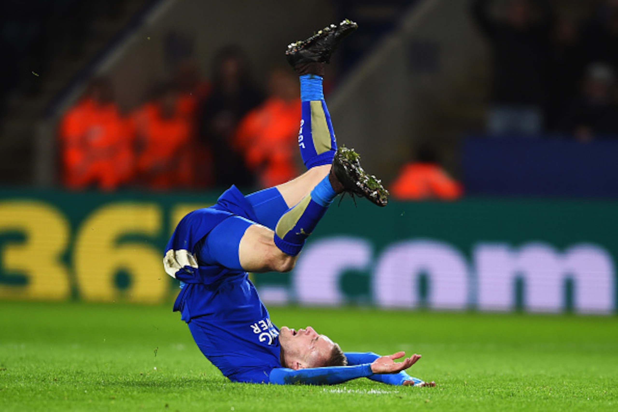 LEICESTER, ENGLAND - DECEMBER 29:  Jamie Vardy of Leicester City tumbles after a shot on goal during the Barclays Premier League match between Leicester City and Manchester City at The King Power Stadium on December 29, 2015 in Leicester, England.  (Photo