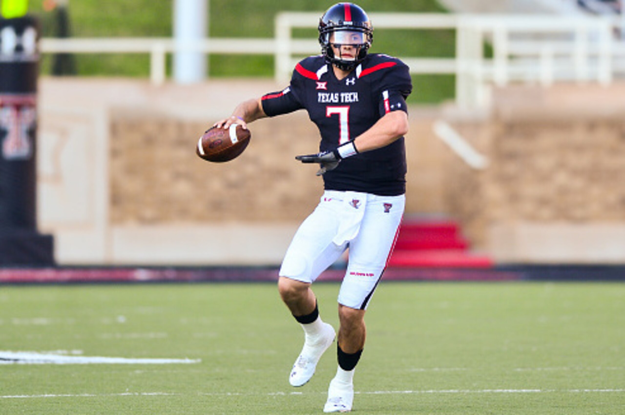 LUBBOCK, TX - OCTOBER 10: Davis Webb #7 of the Texas Tech Red Raiders tools out to pass during the game against the Iowa State Cyclones on October 10, 2015 at Jones AT&T Stadium in Lubbock, Texas. Texas Tech won the game 66-31.  (Photo by John Weast/Getty