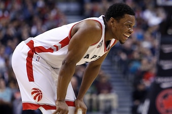 TORONTO, ON - DECEMBER 30:  Kyle Lowry #7 of the Toronto Raptors has a laugh during an NBA game against the Washington Wizards at the Air Canada Centre on December 30, 2015 in Toronto, Ontario, Canada.  NOTE TO USER: User expressly acknowledges and agrees