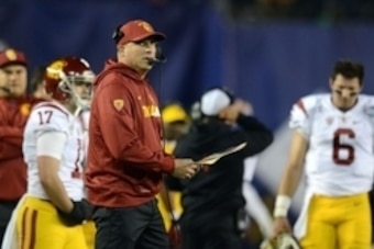Dec 30, 2015; San Diego, CA, USA; USC Trojans head coach Clay Helton looks on against the Wisconsin Badgers during the second quarter in the 2015 Holiday Bowl at Qualcomm Stadium. Mandatory Credit: Jake Roth-USA TODAY Sports