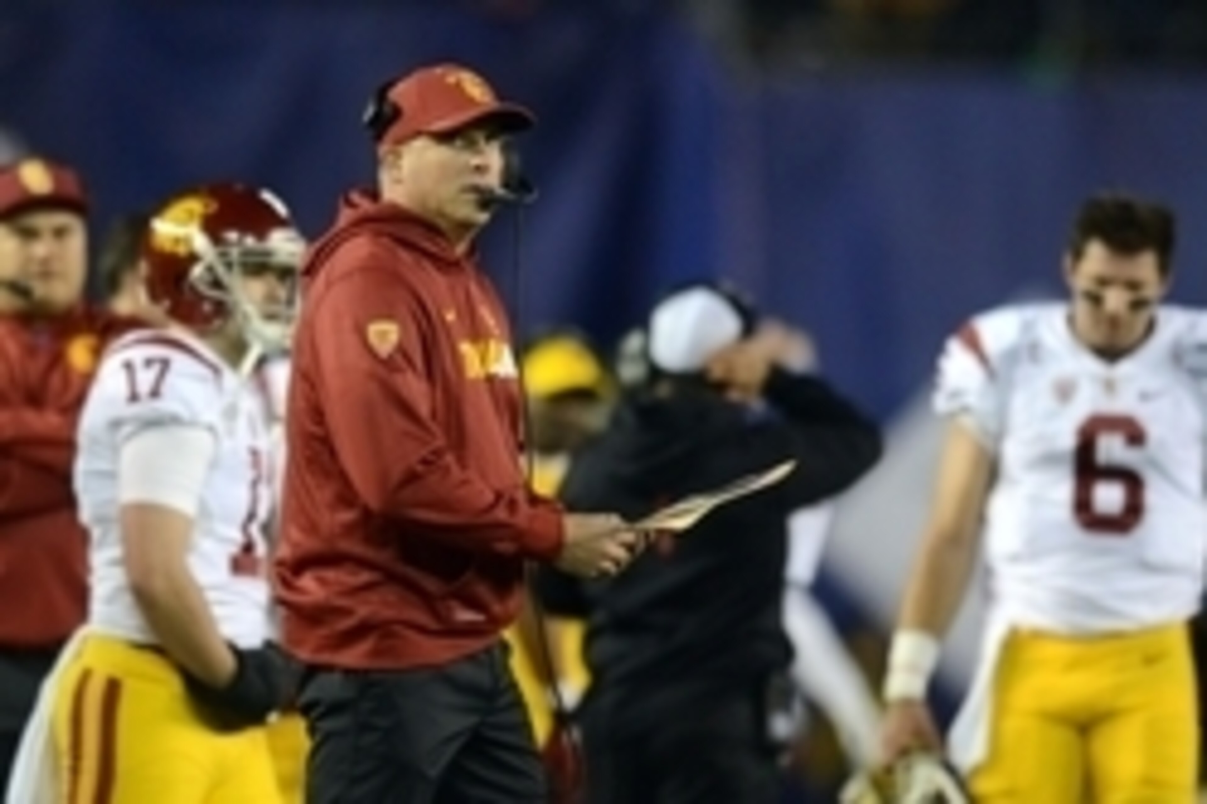 Dec 30, 2015; San Diego, CA, USA; USC Trojans head coach Clay Helton looks on against the Wisconsin Badgers during the second quarter in the 2015 Holiday Bowl at Qualcomm Stadium. Mandatory Credit: Jake Roth-USA TODAY Sports Dec 30, 2015; San Diego, CA, USA; USC Trojans head coach Clay Helton looks on against the Wisconsin Badgers during the second quarter in the 2015 Holiday Bowl at Qualcomm Stadium. Mandatory Credit: Jake Roth-USA TODAY Sports