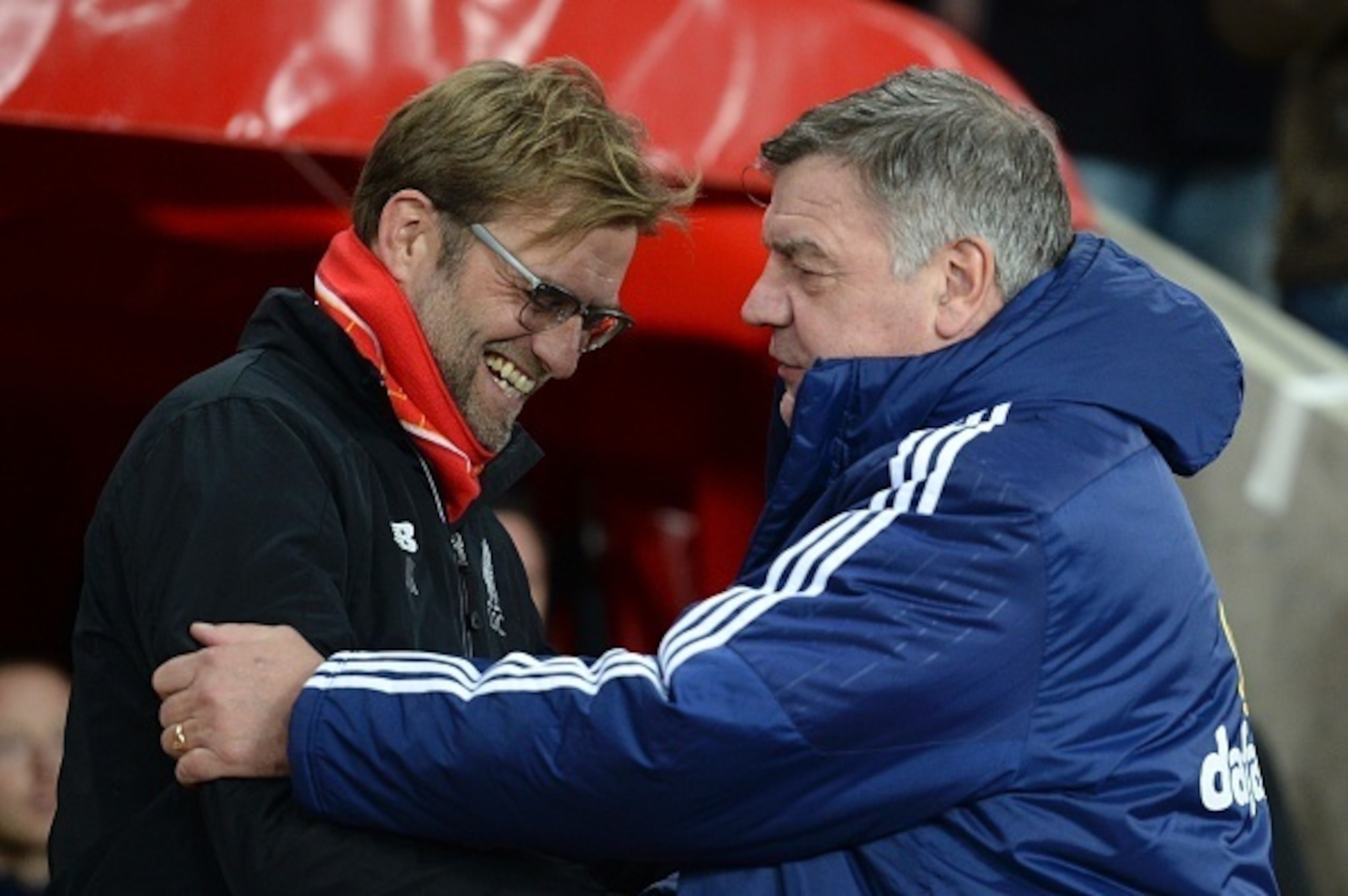 Liverpool's German manager Jurgen Klopp (L) greets Sunderland's English manager Sam Allardyce (R) for the English Premier League football match between Sunderland and Liverpool at the Stadium of Light in Sunderland, north east England, on December 30, 201