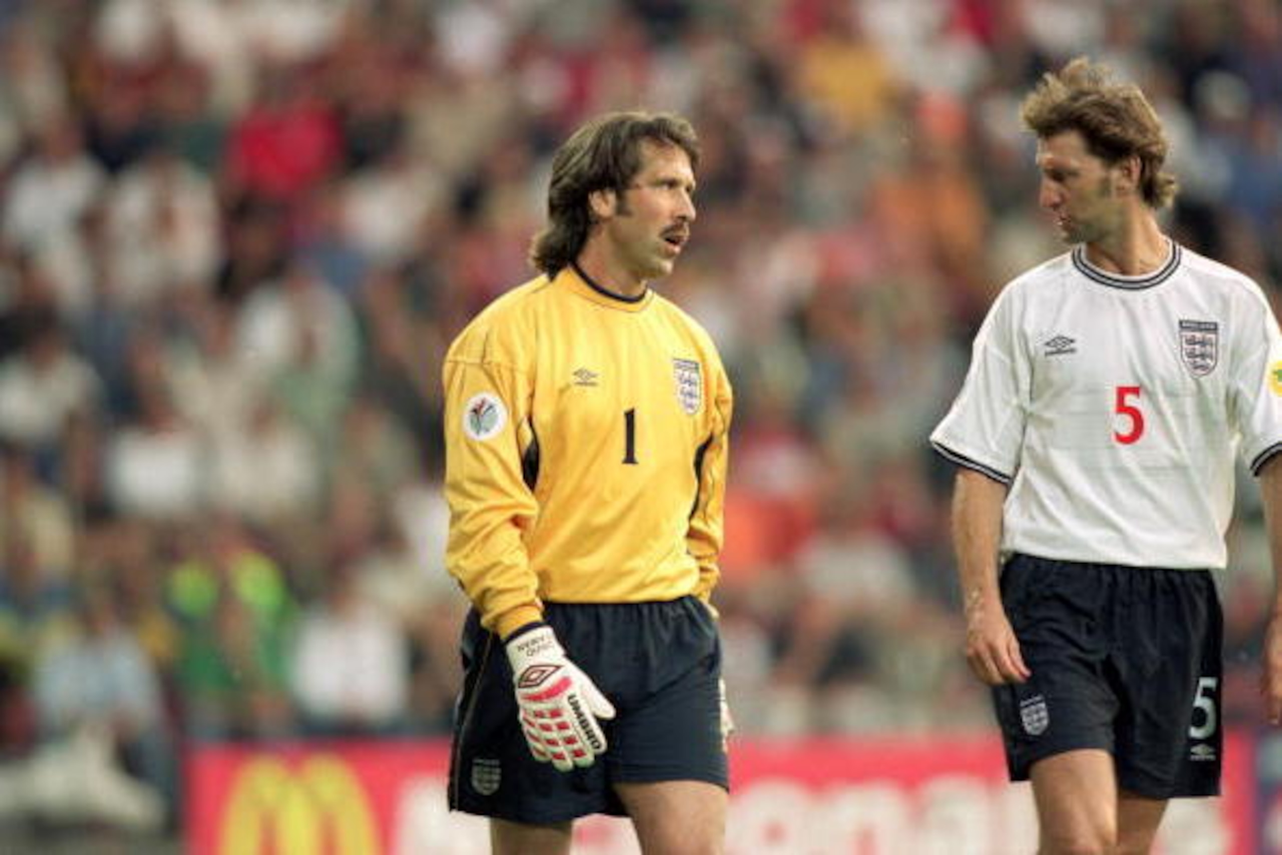 12 Jun 2000:  David Seaman (L) and Tony Adams (R) of England apportion the blame during the European Championships 2000 group match against Portugal at the Philips Stadium in Eindhoven, Holland.  Portugal won the match 3-2. \ Mandatory Credit: Gary M Prio