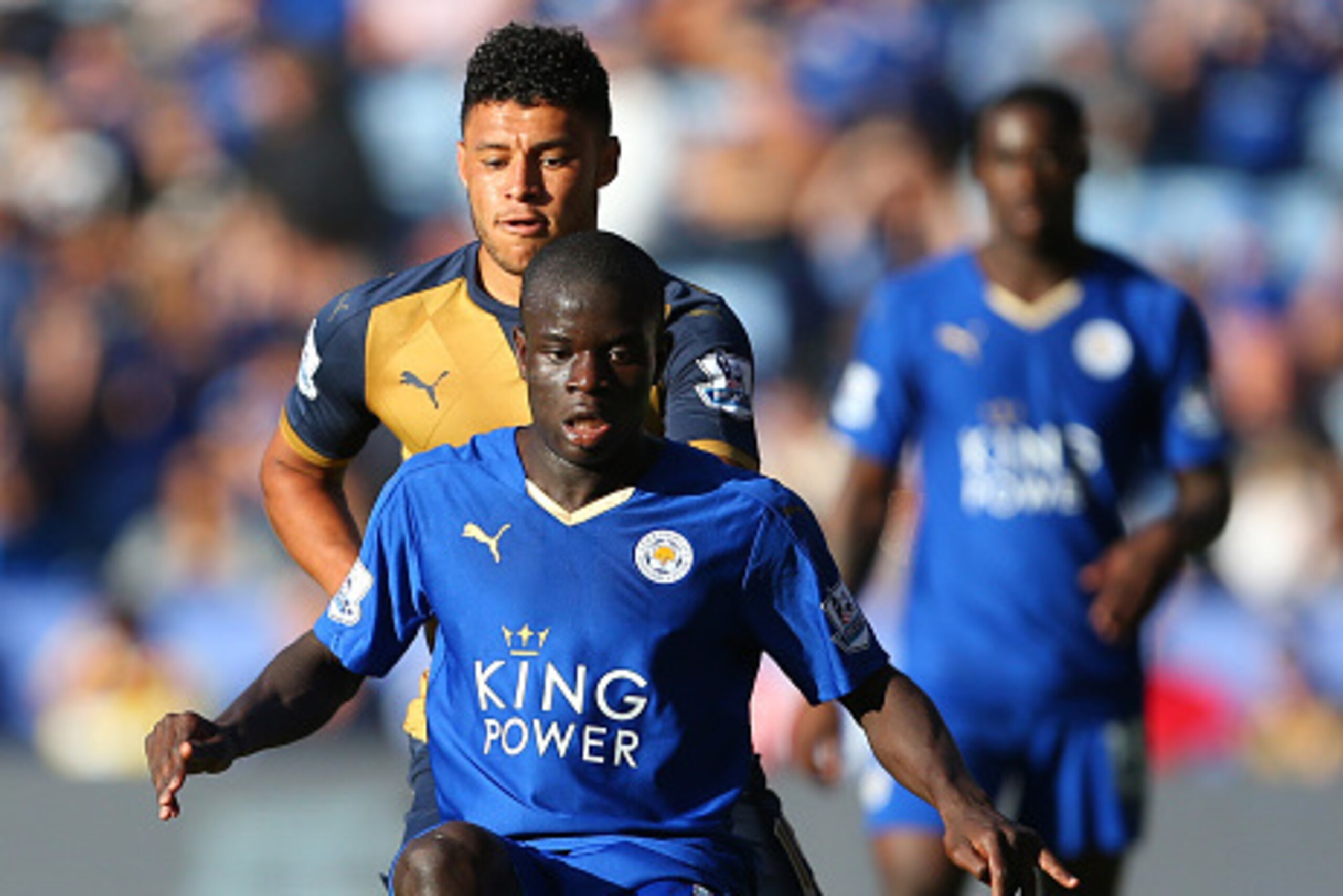 LEICESTER, ENGLAND - SEPTEMBER 26:  Ngolo Kante of Leicester City and Alex Oxlade-Chamberlain of Arsenal during the Barclays Premier League match between Leicester City and Arsenal at The King Power Stadium on September 26, 2015 in Leicester, United Kingd
