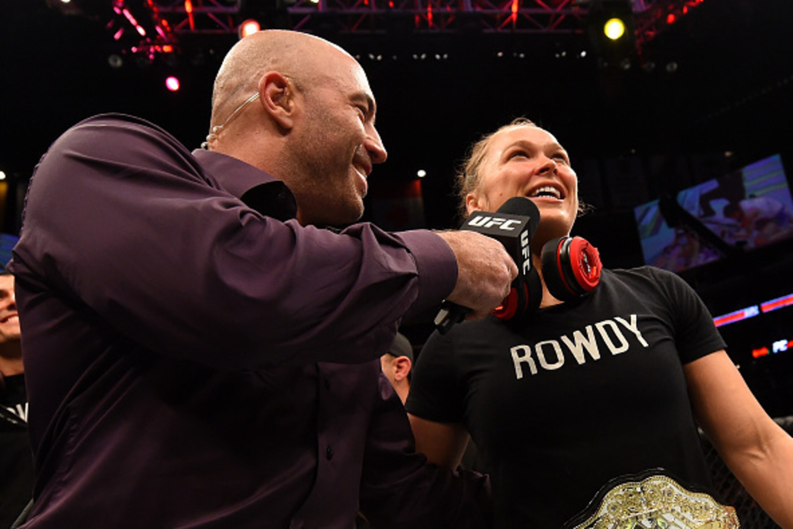 LOS ANGELES, CA - FEBRUARY 28: (L) Joe Rogan interviews Ronda Rousey after her victory over Cat Zingano in their UFC women's bantamweight championship bout during the UFC 184 event at Staples Center on February 28, 2015 in Los Angeles, California. (Phot LOS ANGELES, CA - FEBRUARY 28: (L) Joe Rogan interviews Ronda Rousey after her victory over Cat Zingano in their UFC women's bantamweight championship bout during the UFC 184 event at Staples Center on February 28, 2015 in Los Angeles, California. (Phot