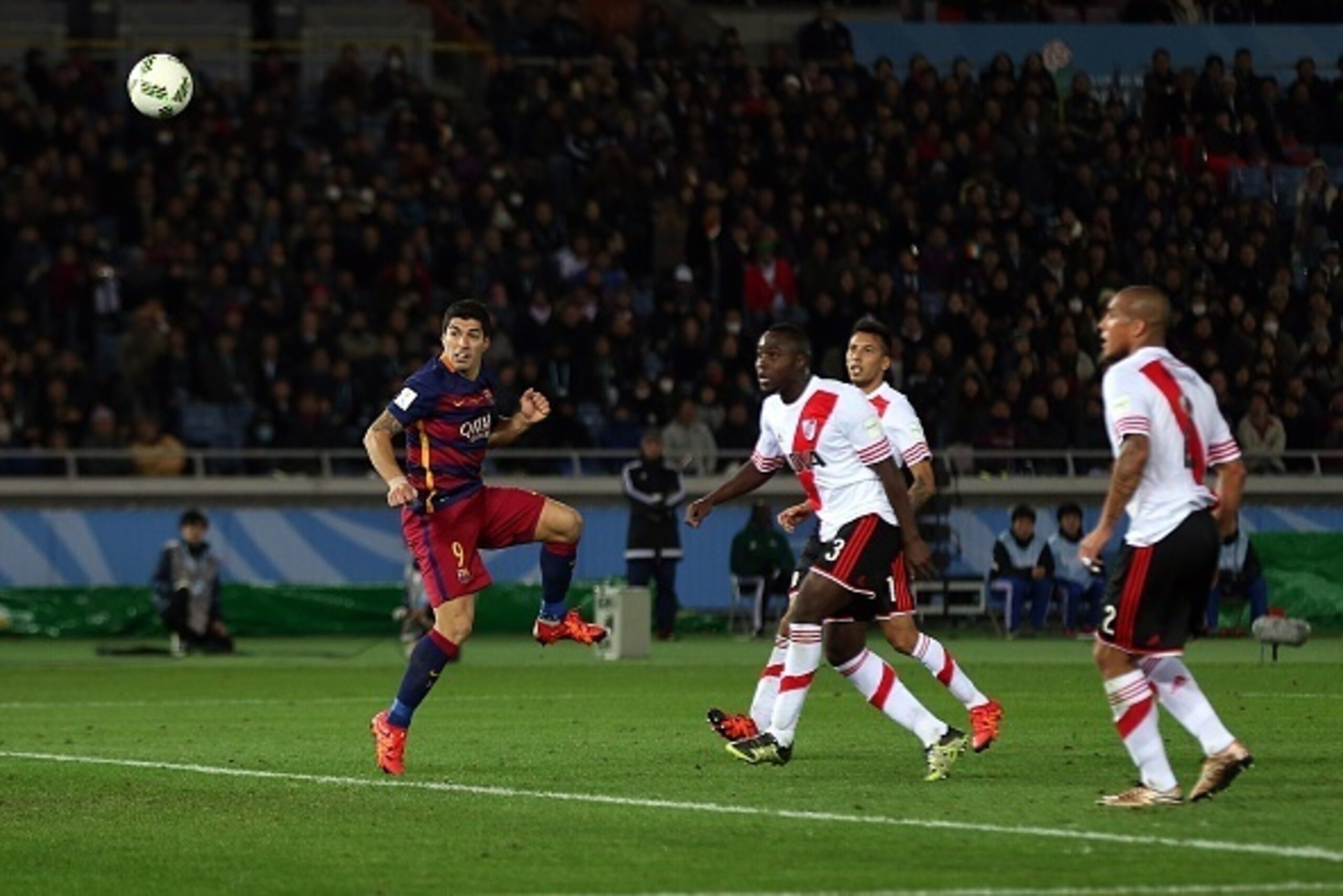 YOKOHAMA, JAPAN - DECEMBER 20: Luis Suarez of Barcelona heads his team's third goal during the FIFA Club World Cup Final match between River Plate and Barcelona at the International Stadium Yokohama on December 20, 2015 in Yokohama, Japan. (Photo by Chris