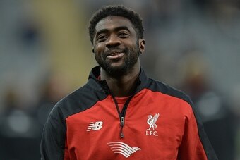 Liverpool's Ivorian defender Kolo Toure reacts as he warms up ahead of the English Premier League football match between Newcastle United and Liverpool at St James' Park in Newcastle-upon-Tyne, north east England, on December 6, 2015.     AFP PHOTO / OLI 