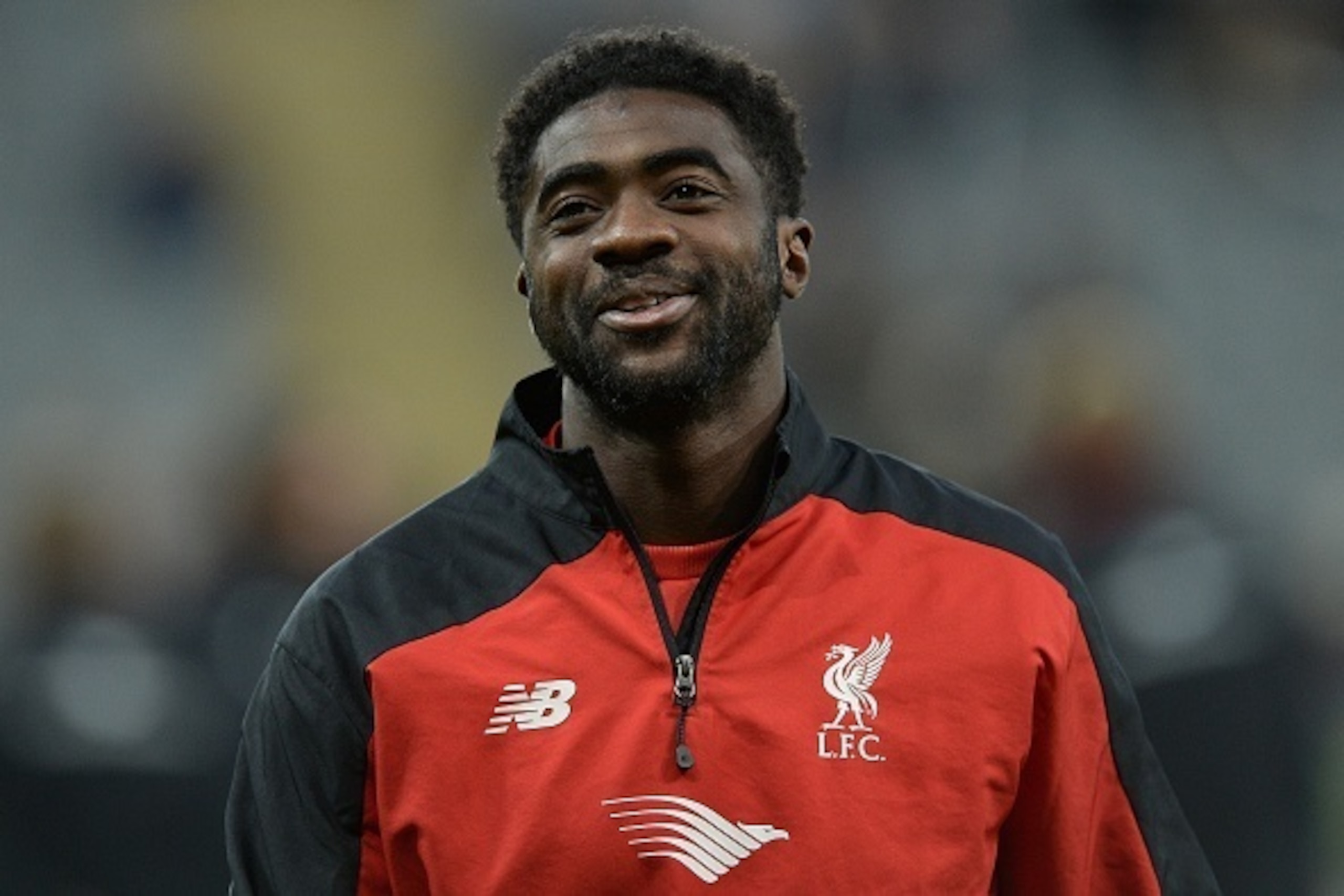 Liverpool's Ivorian defender Kolo Toure reacts as he warms up ahead of the English Premier League football match between Newcastle United and Liverpool at St James' Park in Newcastle-upon-Tyne, north east England, on December 6, 2015.     AFP PHOTO / OLI 