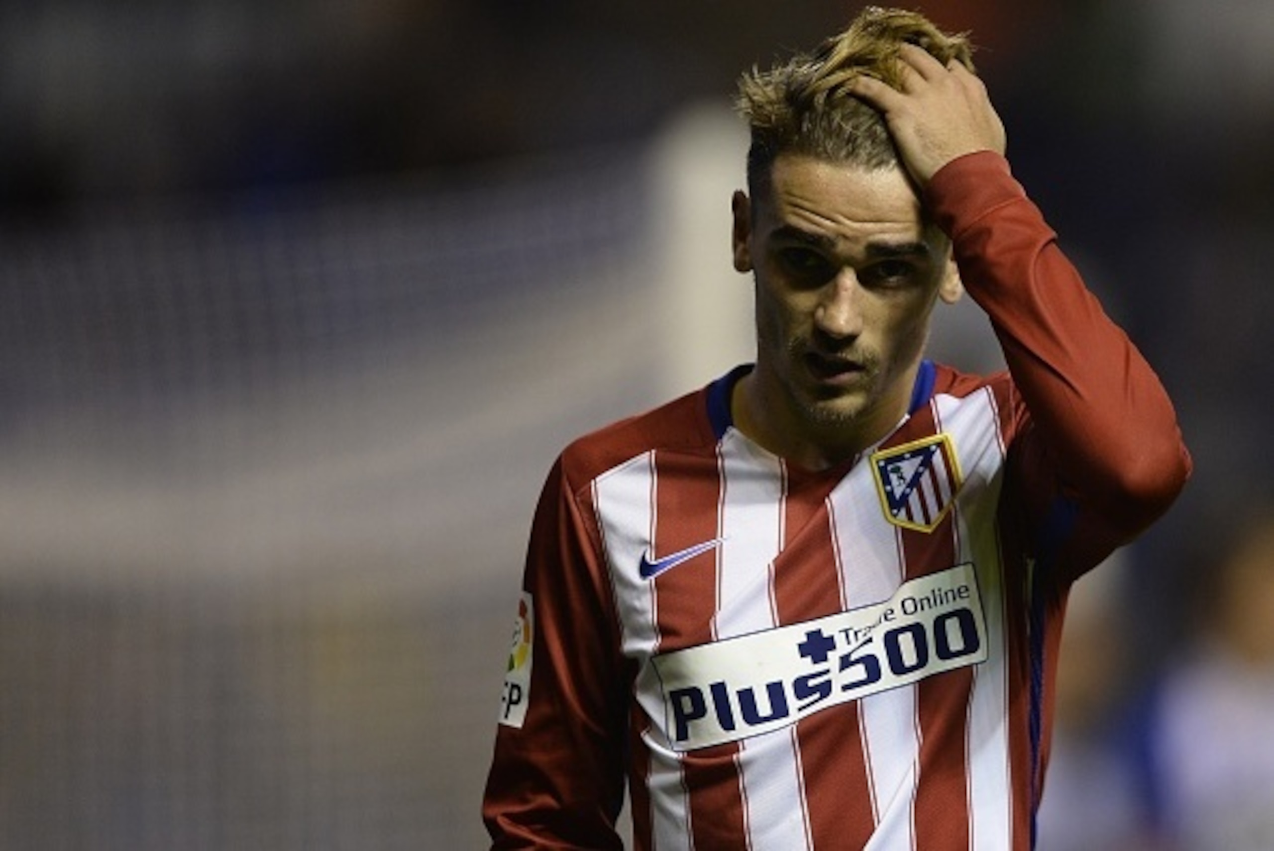 Atletico Madrid's French forward Antoine Griezmann gestures during the Spanish league football match RC Deportivo La Coruna vs Club Atletico de Madrid at the Municipal de Riazor stadium in La Coruna on October 30, 2015. The match finished with a 1-1 draw Atletico Madrid's French forward Antoine Griezmann gestures during the Spanish league football match RC Deportivo La Coruna vs Club Atletico de Madrid at the Municipal de Riazor stadium in La Coruna on October 30, 2015. The match finished with a 1-1 draw