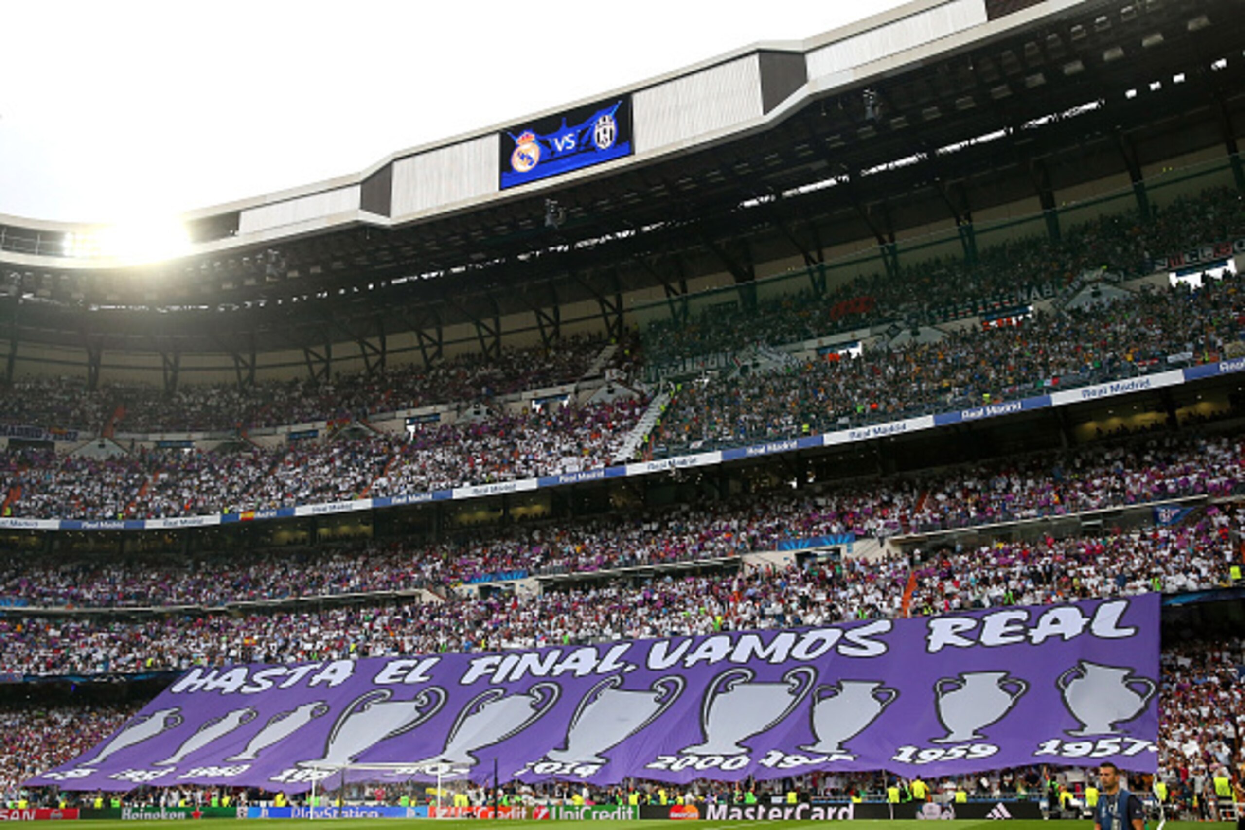 MADRID, SPAIN - MAY 13:  Real Madrid fans hold up banners prior to kickoff during the UEFA Champions League Semi Final, second leg match between Real Madrid and Juventus at Estadio Santiago Bernabeu on May 13, 2015 in Madrid, Spain.  (Photo by Alex Livese