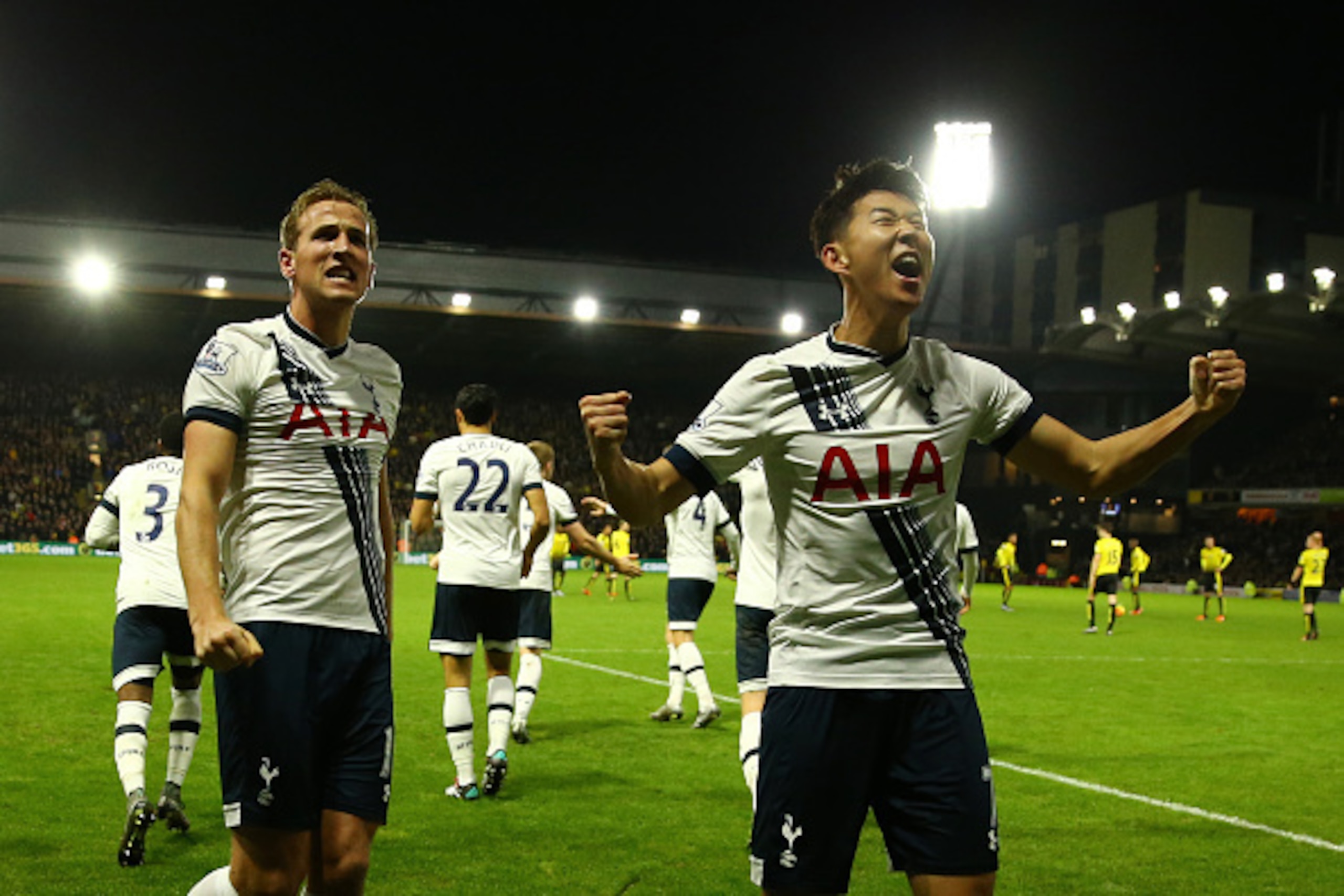 WATFORD, ENGLAND - DECEMBER 28:  Son Heung-min (R) of Tottenham Hotspur celebrates scoring his team's second goal with his team mate Harry Kane (L) during the Barclays Premier League match between Watford and Tottenham Hotspur at Vicarage Road on December