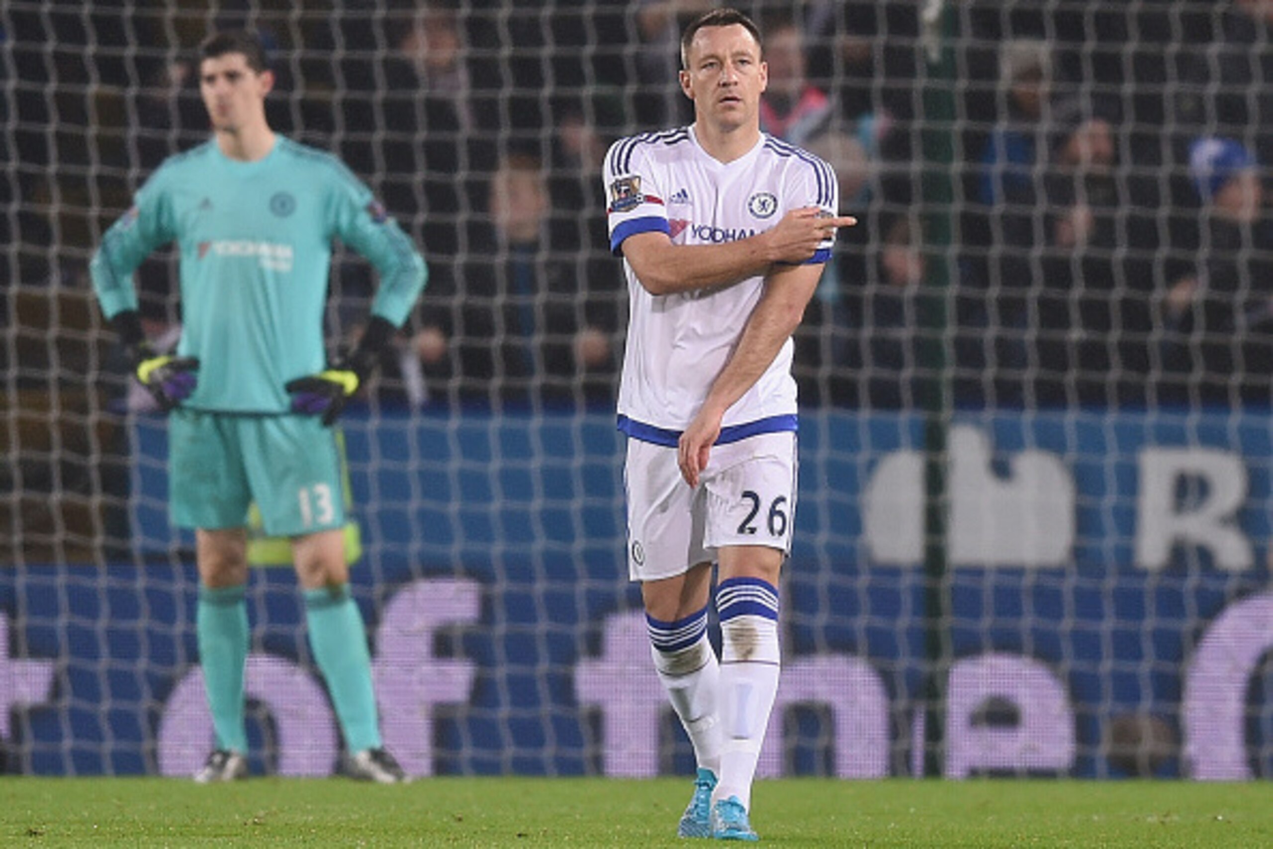 LEICESTER, ENGLAND - DECEMBER 14: Thibaut Courtois and John Terry of Chelsea look dejected after the first goal during the Barclays Premier League match between Leicester City and Chelsea at the King Power Stadium on December14, 2015 in Leicester, United 