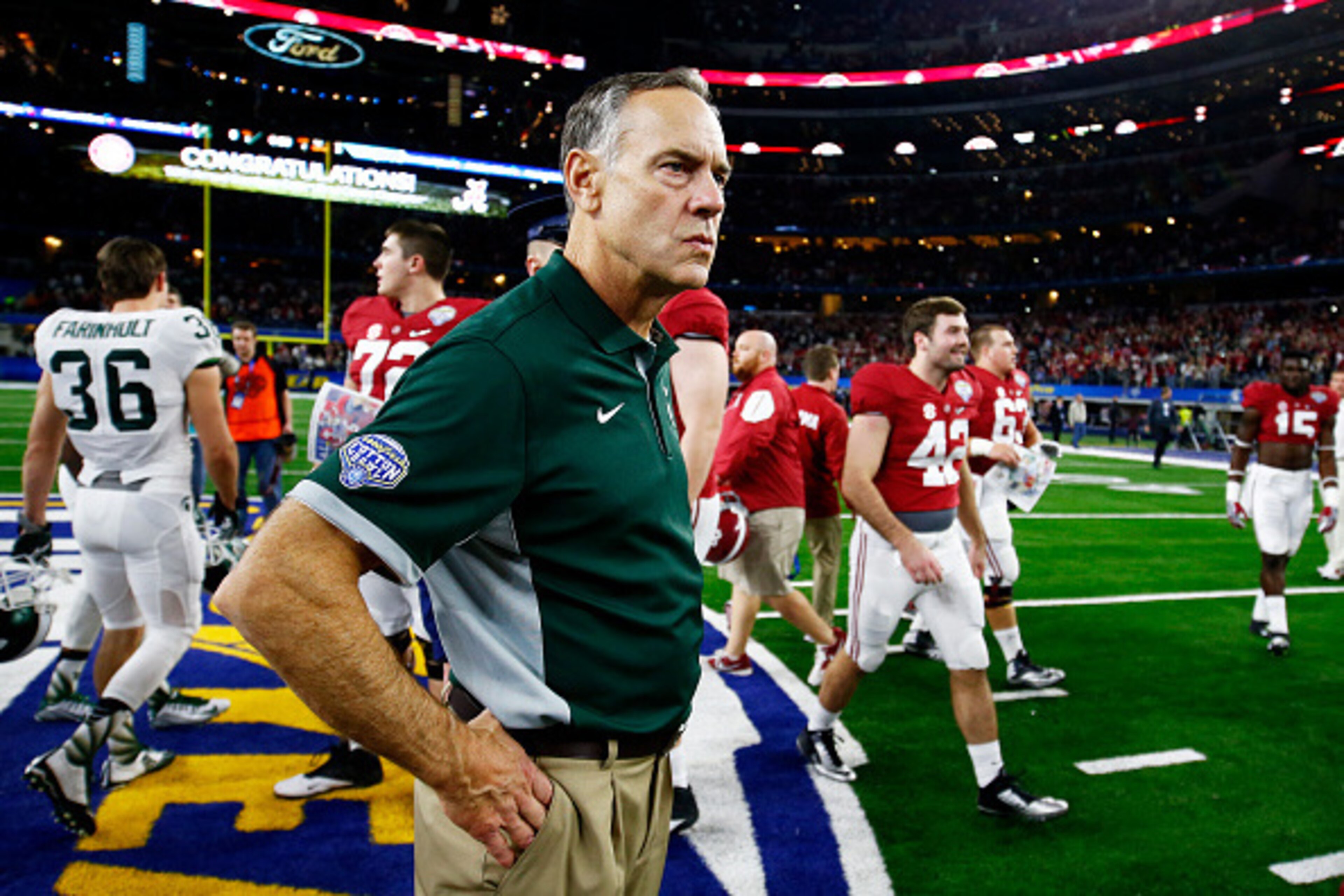 ARLINGTON, TX - DECEMBER 31: Head coach Mark Dantonio reacts at midfield after losing 38-0 to the Alabama Crimson Tide during the Goodyear Cotton Bowl at AT&T Stadium on December 31, 2015 in Arlington, Texas. (Photo by Scott Halleran/Getty Images) ARLINGTON, TX - DECEMBER 31: Head coach Mark Dantonio reacts at midfield after losing 38-0 to the Alabama Crimson Tide during the Goodyear Cotton Bowl at AT&T Stadium on December 31, 2015 in Arlington, Texas. (Photo by Scott Halleran/Getty Images)