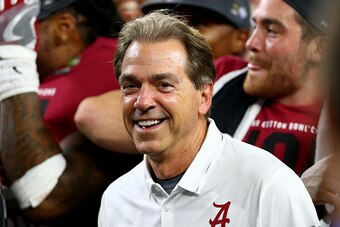 ARLINGTON, TX - DECEMBER 31:  Head coach Nick Saban of the Alabama Crimson Tide celebrates with the trophy after defeating the Spartans 38 to 0 in the Goodyear Cotton Bowl at AT&T Stadium on December 31, 2015 in Arlington, Texas.  (Photo by Ronald Martine
