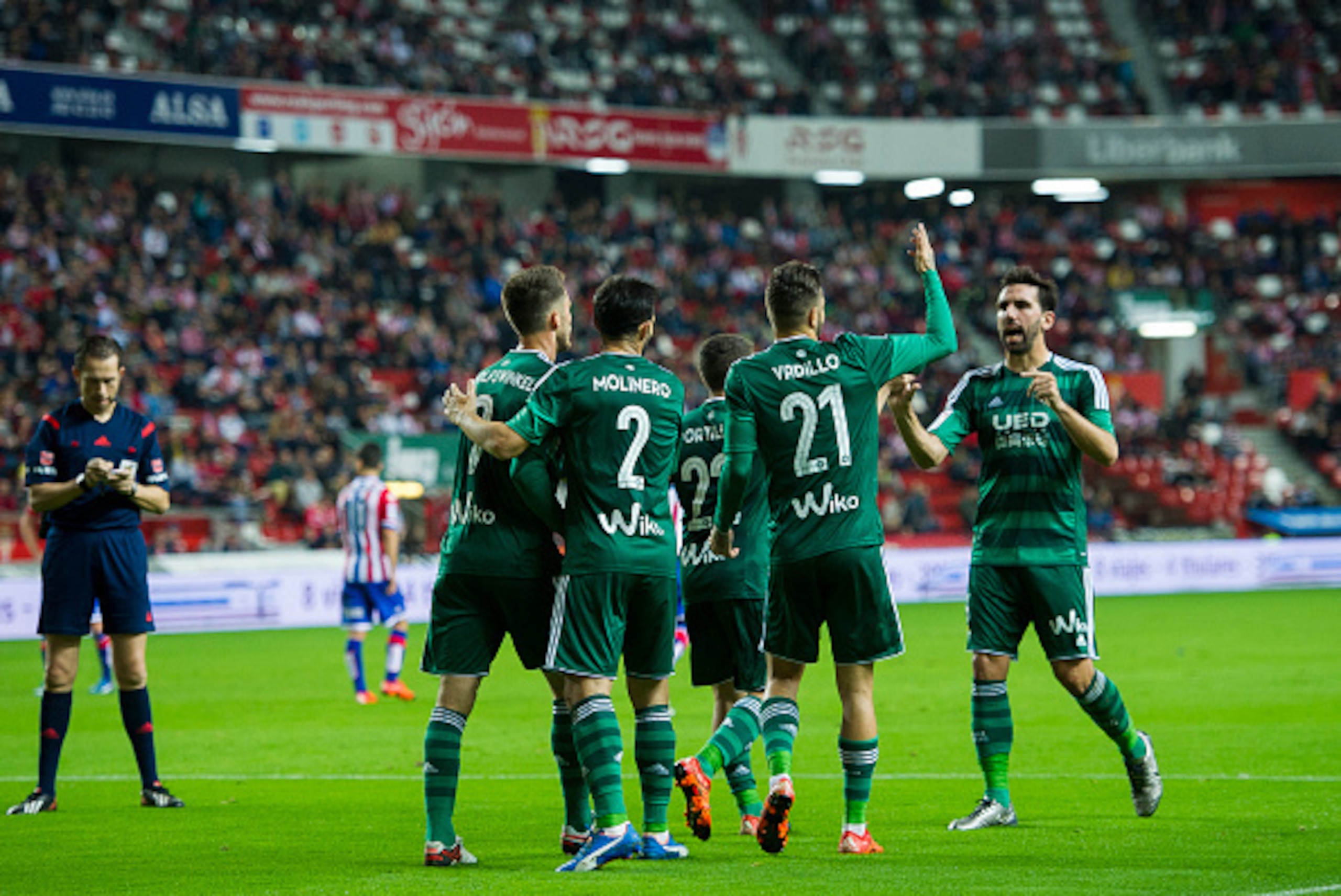 GIJON, SPAIN - DECEMBER 15:  Ricky van Wolfswinkel (L) of Real Betis Balompie celebrates after scoring during the Copa del Rey Round of 32 match between Real Sporting de Gijon and Real Betis Balompie at Estadio El Molinon on December 15, 2015 in Gijon, Sp