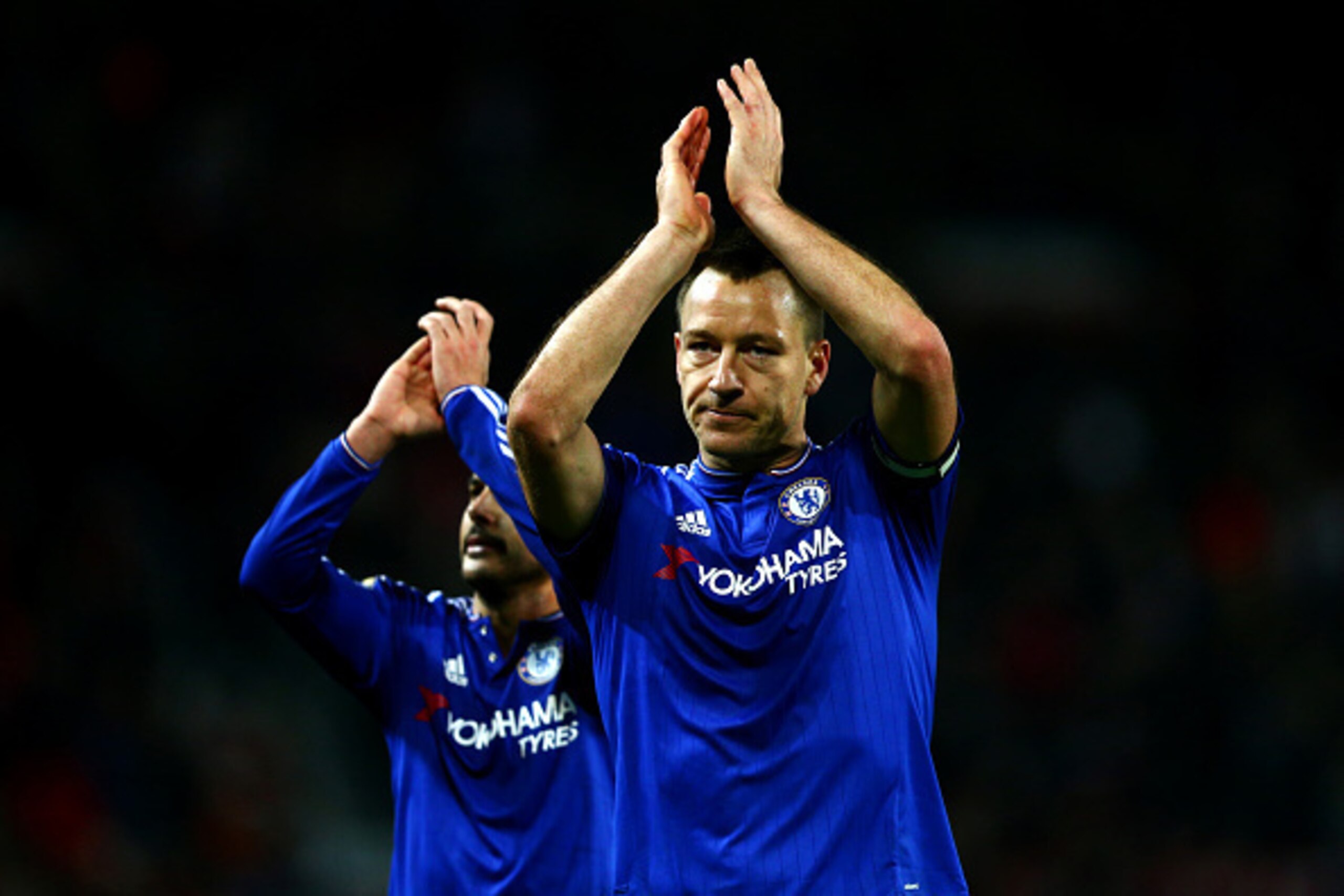 MANCHESTER, ENGLAND - DECEMBER 28:  John Terry of Chelsea and Pedro of Chelsea applaud the fans after the Barclays Premier League match between Manchester United and Chelsea at Old Trafford on December 28, 2015 in Manchester, England.  (Photo by Clive Mas