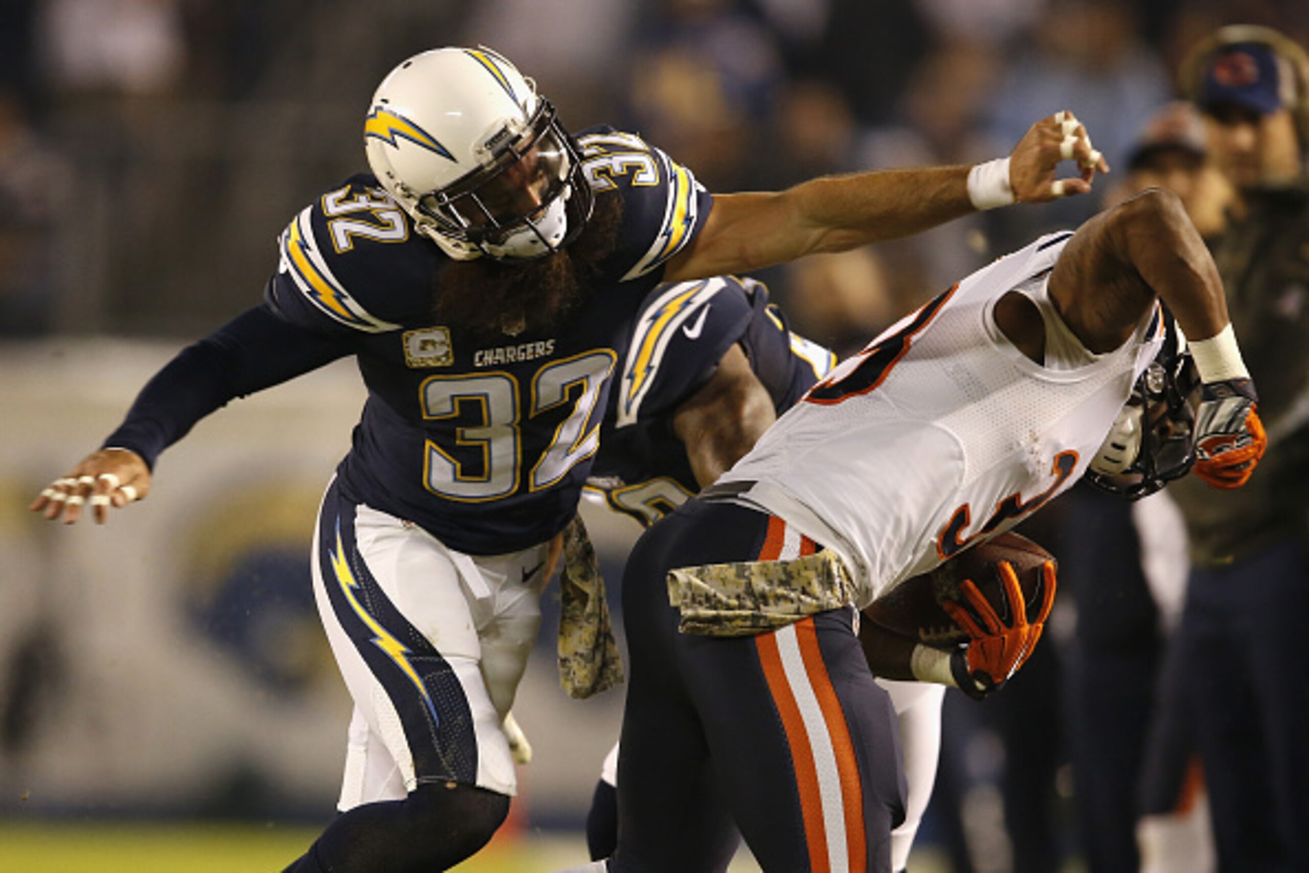 SAN DIEGO, CA - NOVEMBER 09:  Eric Weddle #32 of the San Diego Chargers defends against Jeremy Langford #33 of the Chicago Bears at Qualcomm Stadium on November 9, 2015 in San Diego, California.  (Photo by Sean M. Haffey/Getty Images)