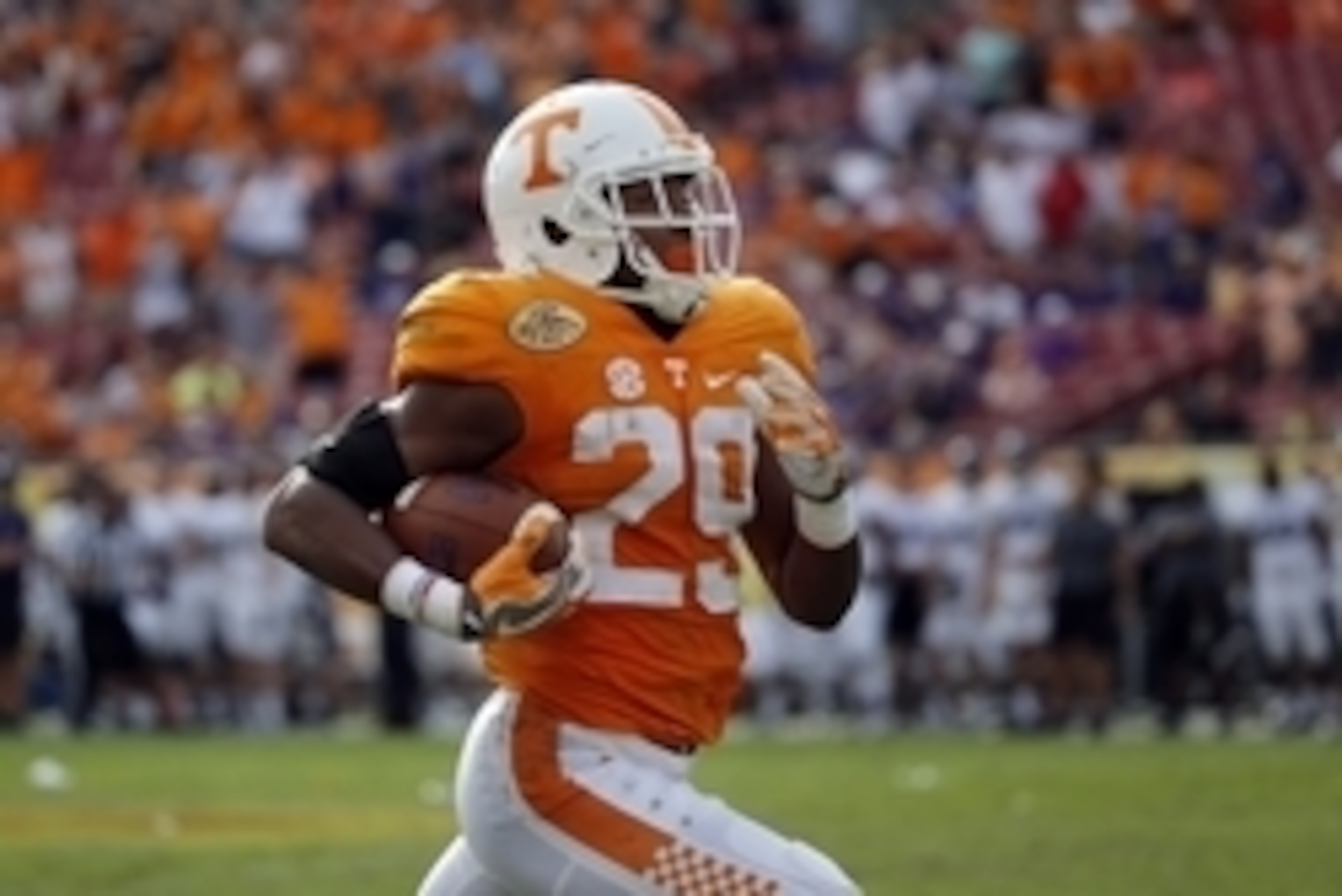 Jan 1, 2016; Tampa, FL, USA; Tennessee Volunteers defensive back Evan Berry (29) runs the ball back for 100 yard touchdown during the second half against the Northwestern Wildcats in the 2016 Outback Bowl at Raymond James Stadium. Tennessee Volunteers def