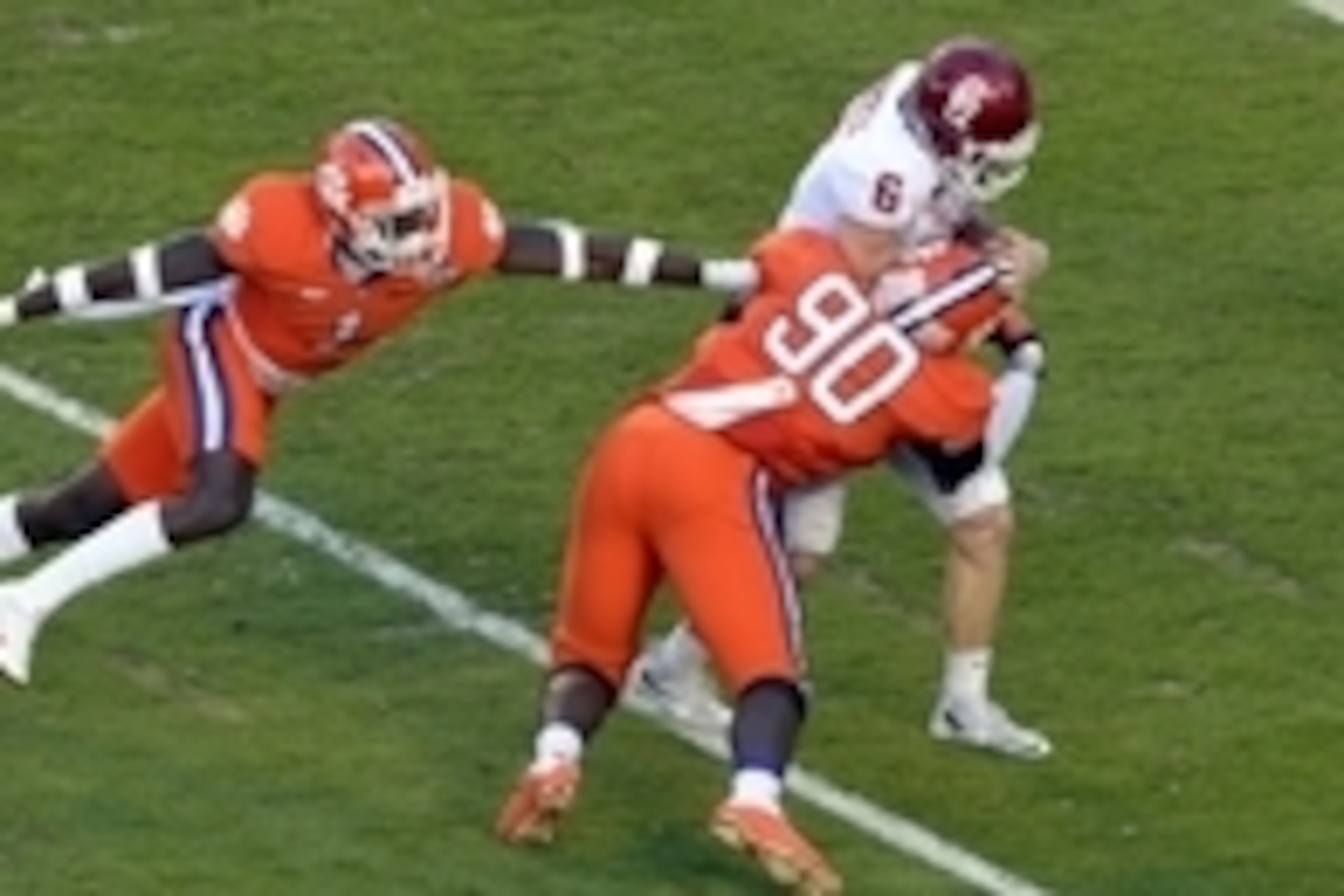 Dec 31, 2015; Miami Gardens, FL, USA; Oklahoma Sooners quarterback Baker Mayfield (6) is sacked on the 2 yard line against Clemson Tigers defensive end Shaq Lawson (90) and safety Jayron Kearse (1) during the first quarter of the 2015 CFP semifinal at the