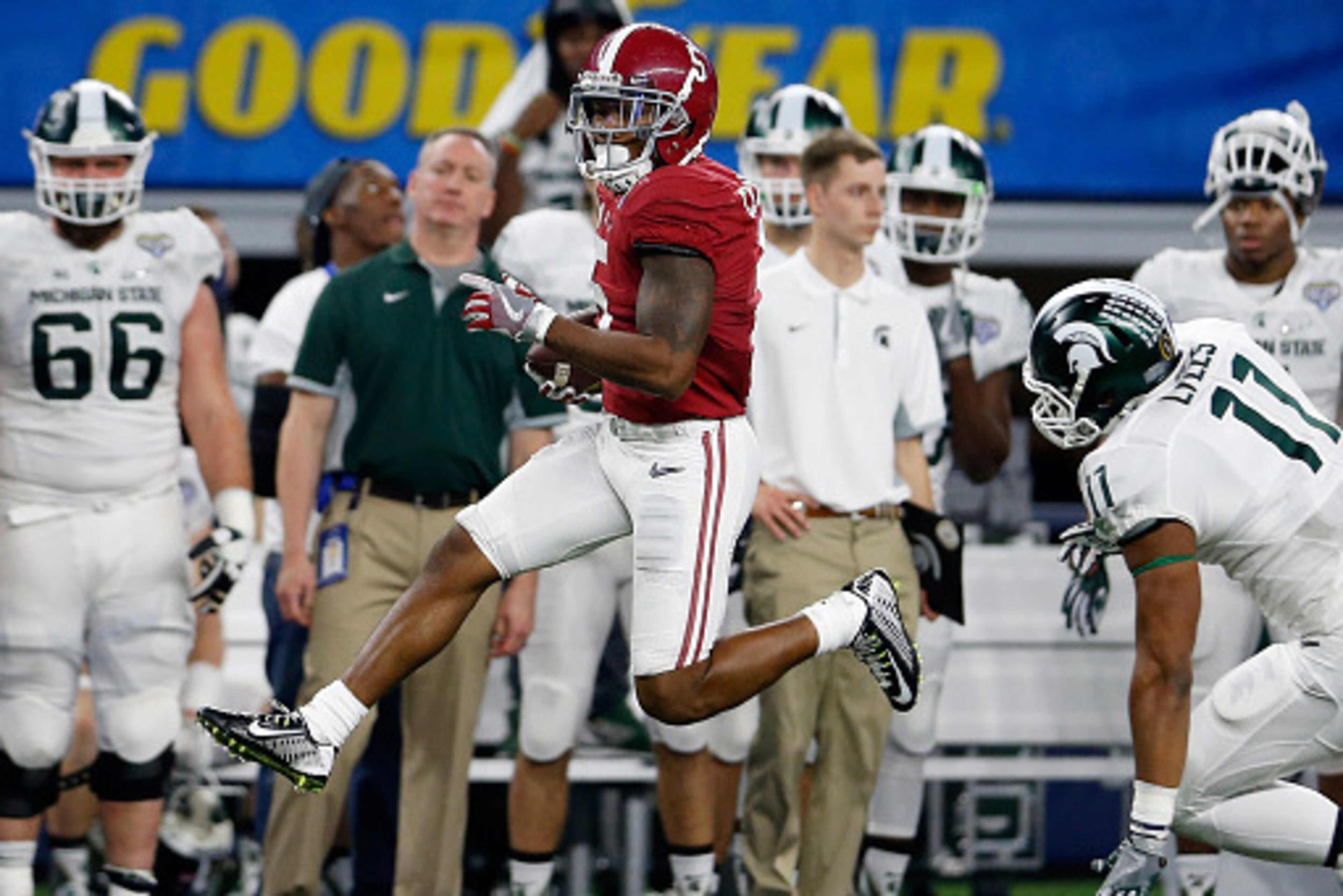 ARLINGTON, TX - DECEMBER 31:  Cyrus Jones #5 of the Alabama Crimson Tide returns a punt for a 57 yard touchdown in the third quarter against the Michigan State Spartans during the Goodyear Cotton Bowl at AT&T Stadium on December 31, 2015 in Arlington, Tex