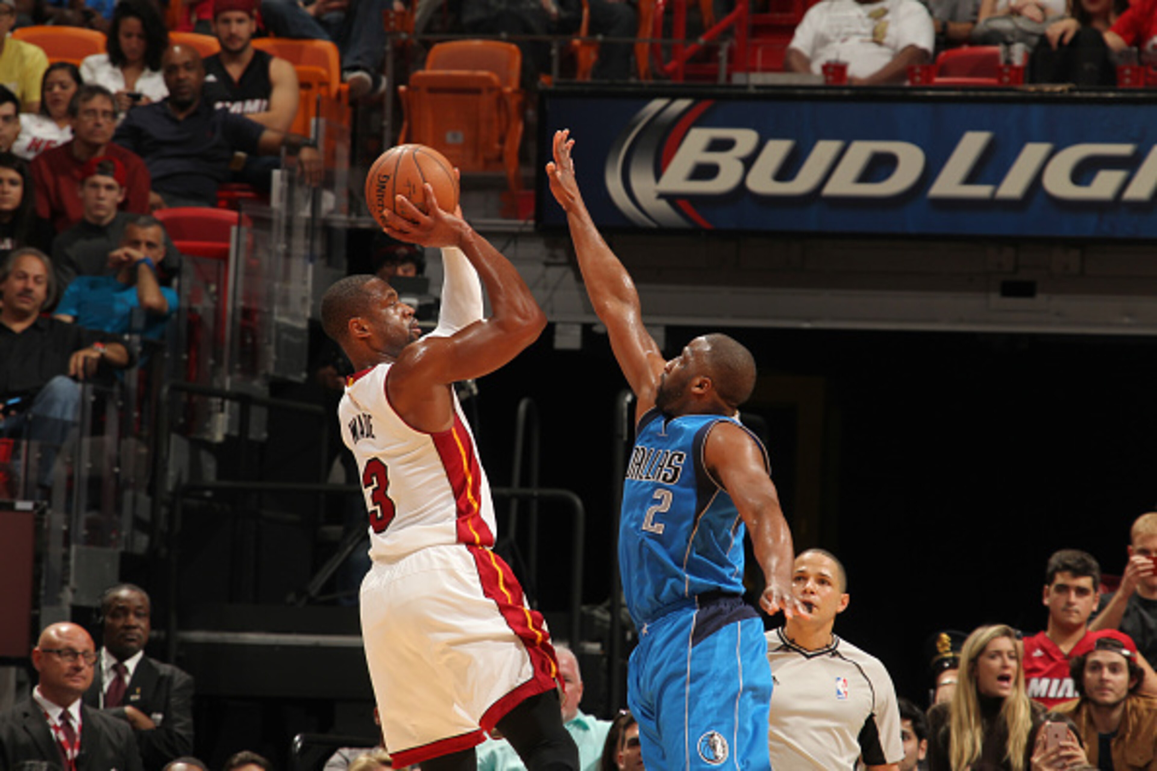 MIAMI, FL - JANUARY 1:  Dwyane Wade #3 of the Miami Heat shoots the ball against Raymond Felton #2 of the Dallas Mavericks on January 1, 2016 at American Airlines Arena in Miami, Florida. NOTE TO USER: User expressly acknowledges and agrees that, by downl
