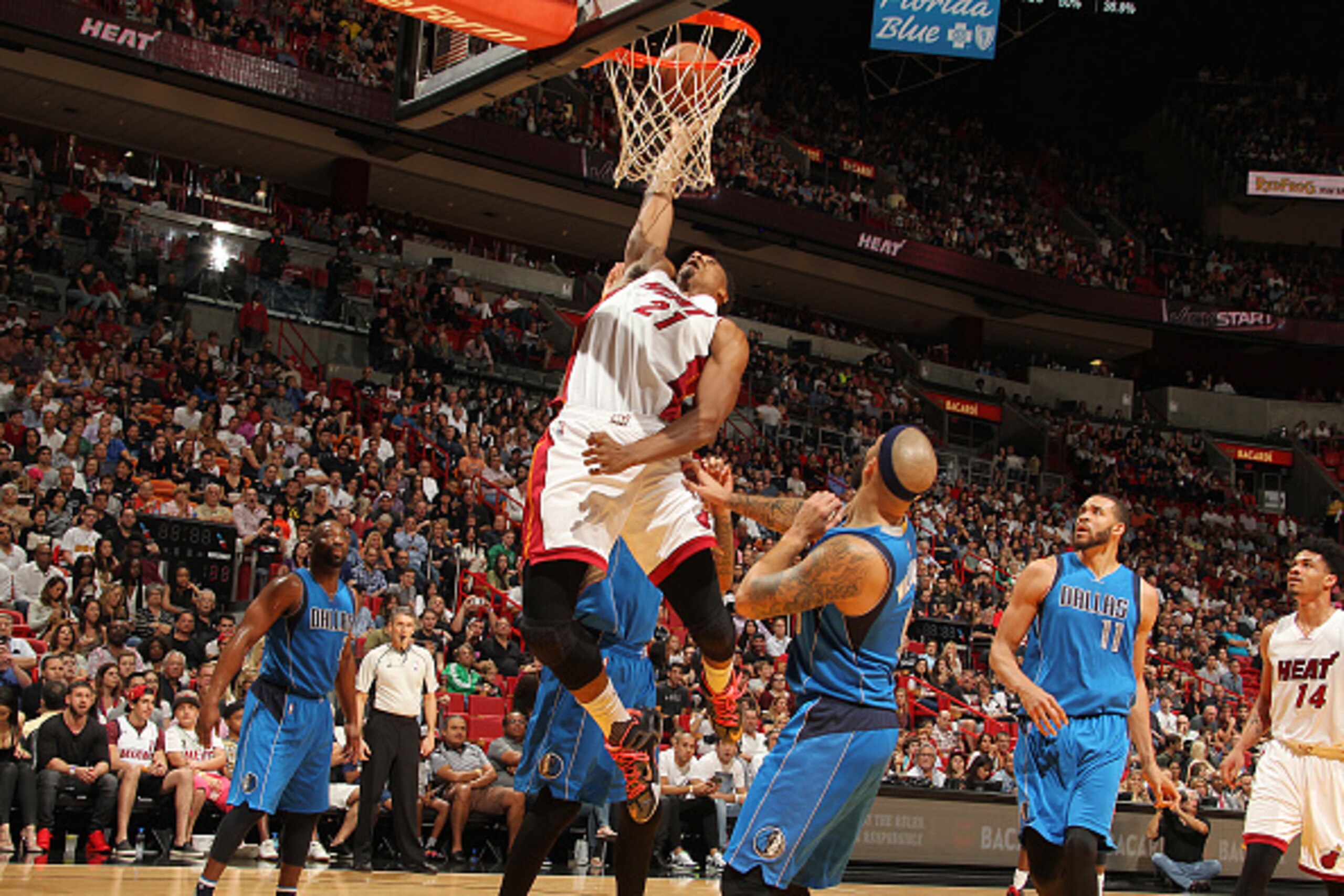 MIAMI, FL - JANUARY 1:  Hassan Whiteside #21 of the Miami Heat shoots the ball against the Dallas Mavericks on January 1, 2016 at American Airlines Arena in Miami, Florida. NOTE TO USER: User expressly acknowledges and agrees that, by downloading and or u