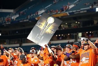MIAMI GARDENS, FL - DECEMBER 31:  Clemson Tigers players celebrate defeating the Oklahoma Sooners with a score of 37 to 17 to win the 2015 Capital One Orange Bowl at Sun Life Stadium on December 31, 2015 in Miami Gardens, Florida.  (Photo by Streeter Leck