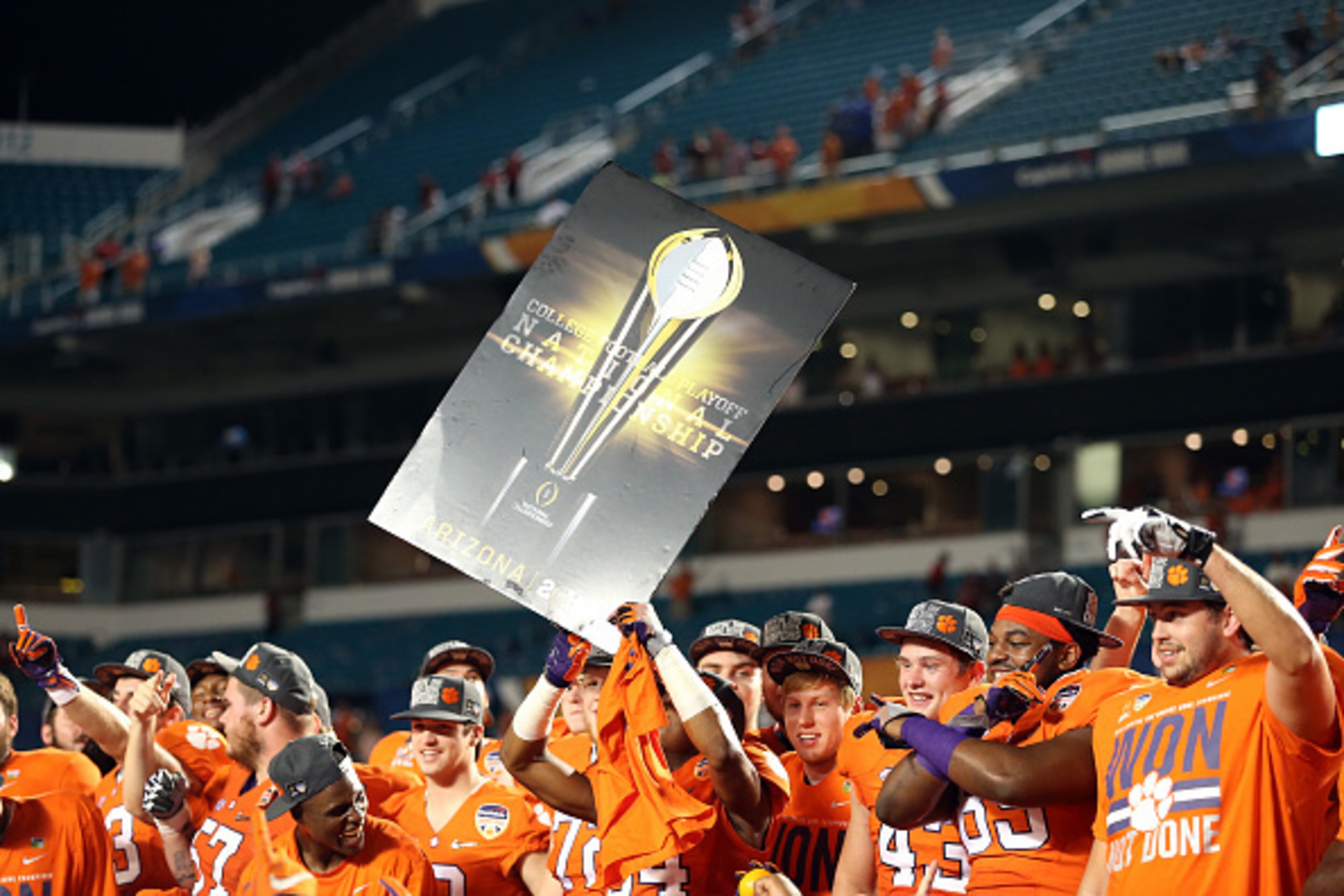 MIAMI GARDENS, FL - DECEMBER 31: Clemson Tigers players celebrate defeating the Oklahoma Sooners with a score of 37 to 17 to win the 2015 Capital One Orange Bowl at Sun Life Stadium on December 31, 2015 in Miami Gardens, Florida. (Photo by Streeter Leck MIAMI GARDENS, FL - DECEMBER 31: Clemson Tigers players celebrate defeating the Oklahoma Sooners with a score of 37 to 17 to win the 2015 Capital One Orange Bowl at Sun Life Stadium on December 31, 2015 in Miami Gardens, Florida. (Photo by Streeter Leck