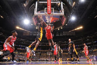 LOS ANGELES, CA - JANUARY 1:  Roy Hibbert #17 of the Los Angeles Lakers shoots the ball against Jerami Grant #39 of the Philadelphia 76ers on January 1, 2016 at STAPLES Center in Los Angeles, California. NOTE TO USER: User expressly acknowledges and agree