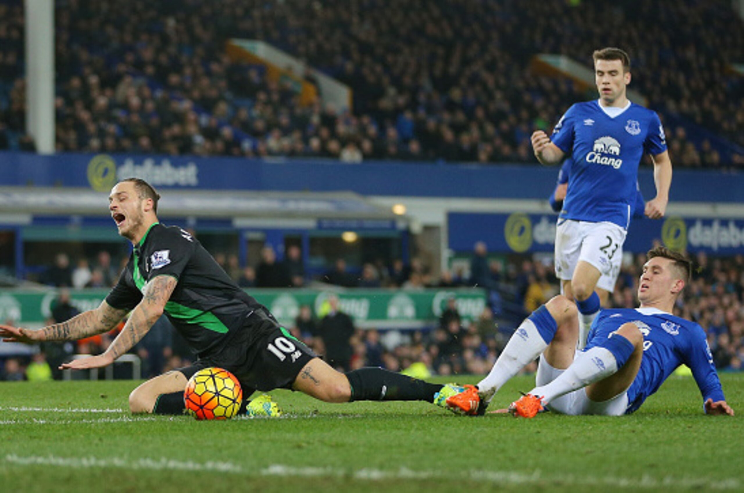 LIVERPOOL, ENGLAND - DECEMBER 28:  Marko Arnautovic of Stoke City is fouled by John Stones of Everton resulting in the penalty during the Barclays Premier League match between Everton and Stoke City at Goodison Park on December 28, 2015 in Liverpool, Engl