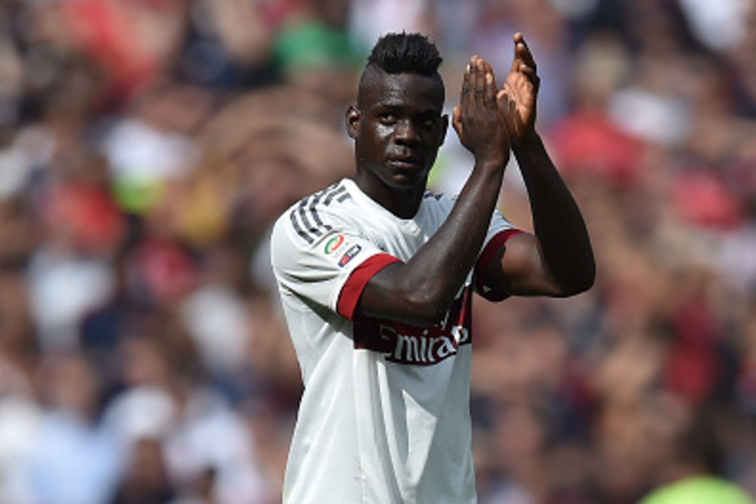 GENOA, ITALY - SEPTEMBER 27:  Mario Balotelli of AC Milan salutes the fans at the end of the Serie A match between Genoa CFC and AC Milan at Stadio Luigi Ferraris on September 27, 2015 in Genoa, Italy.  (Photo by Valerio Pennicino/Getty Images)